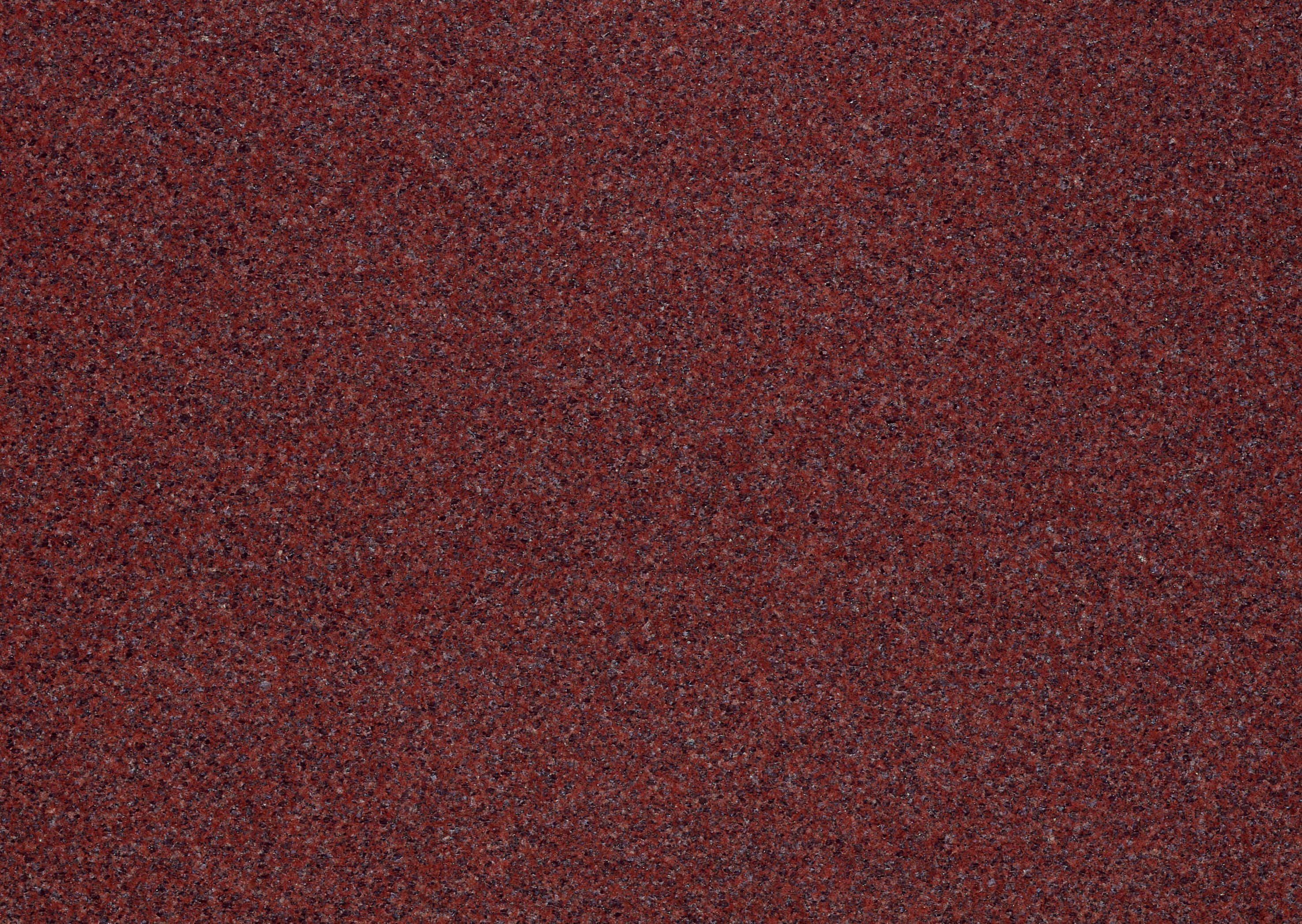 Granite 桌布 壁紙 — 深酒紅色紋理地毯特寫，帶有細微的灰色和黑色斑點。
