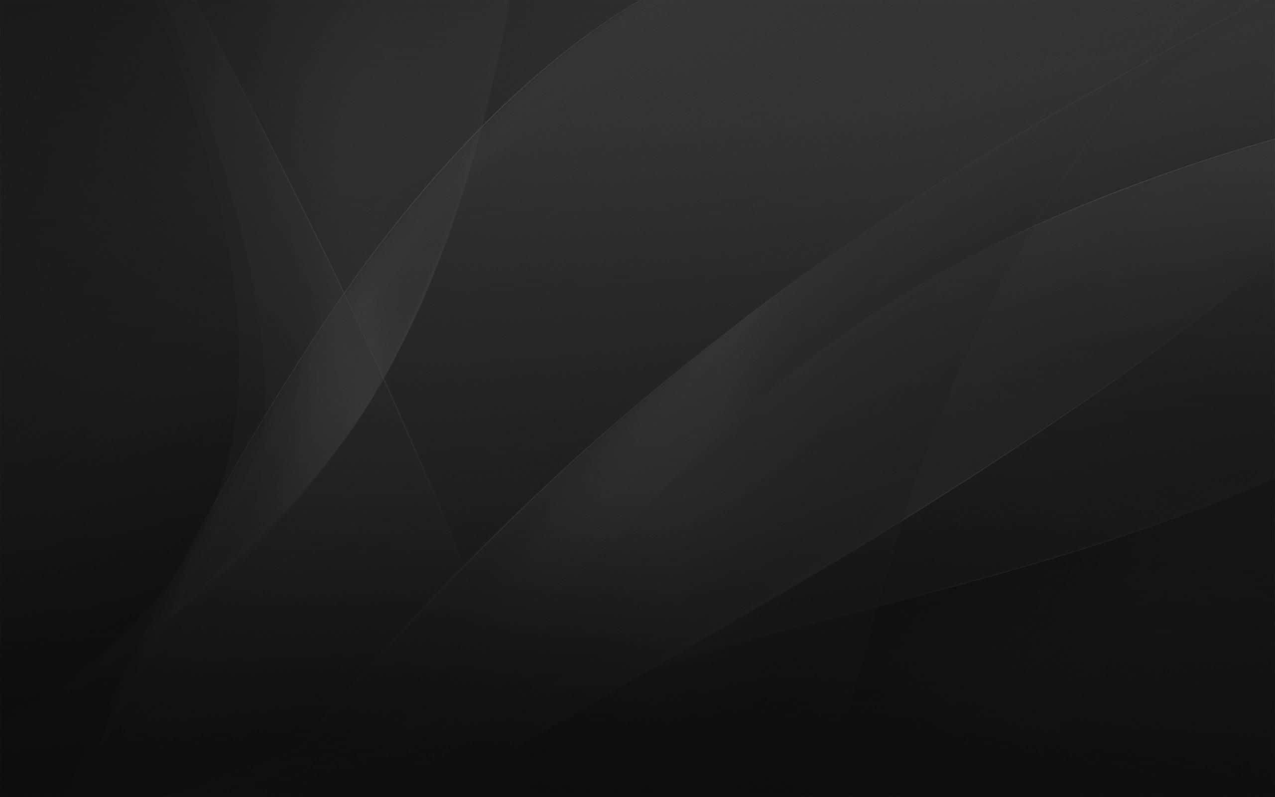 Plain Black Desktop 桌布 壁紙 — 深黑色背景上帶有柔和灰色漸變和流暢對角線的極簡抽象壁紙。