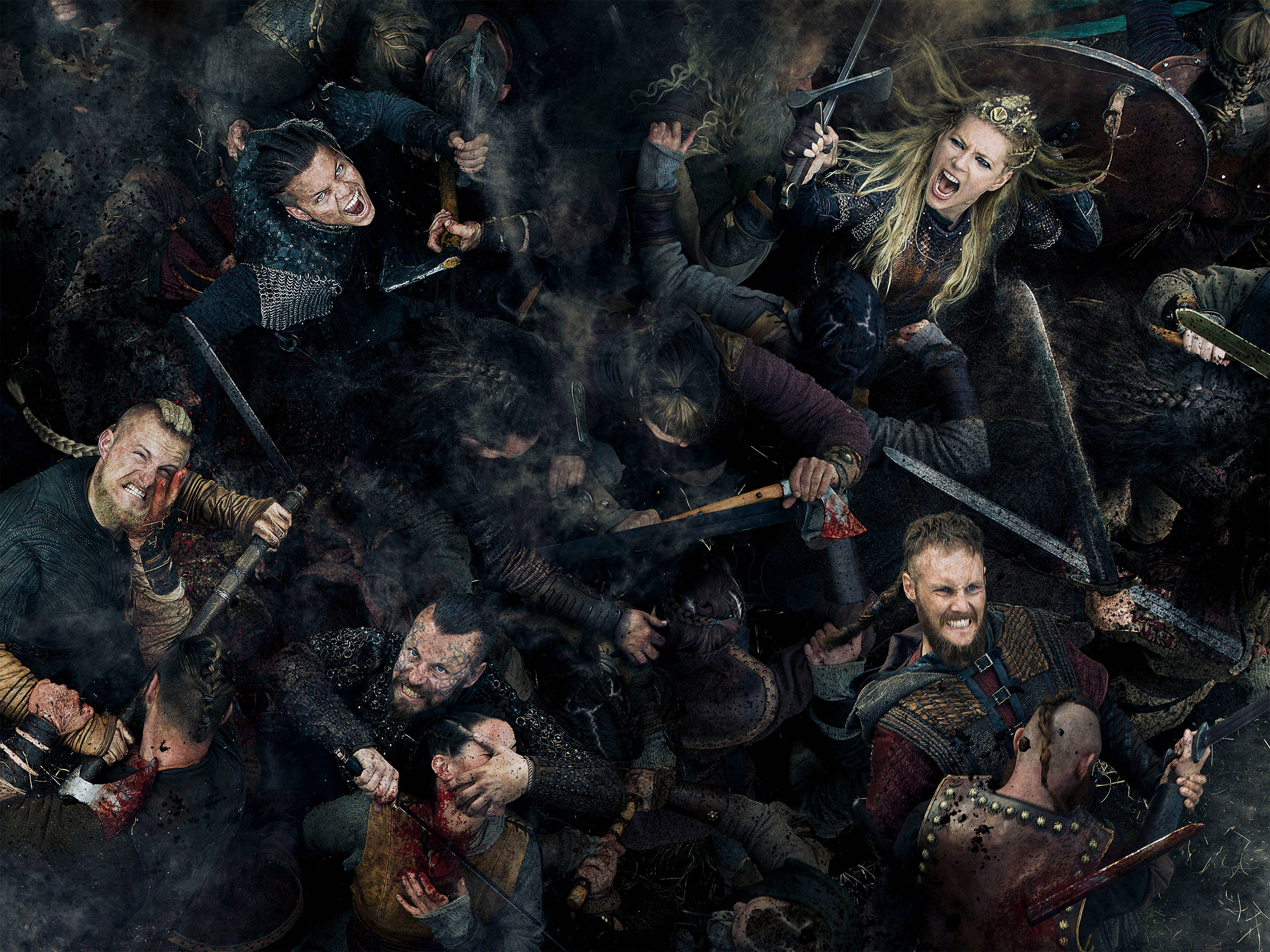 Vikings 桌布 壁紙 — 混亂的維京戰役場景，戰士們在煙霧和鮮血中尖叫廝殺。