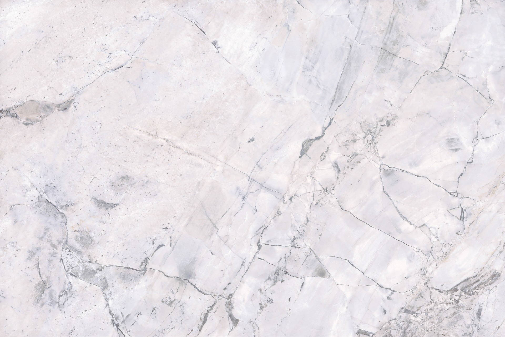Marble Desktop 桌布 壁紙 — 淺灰色大理石表面的特寫，帶有細微紋理和天然石材質感。