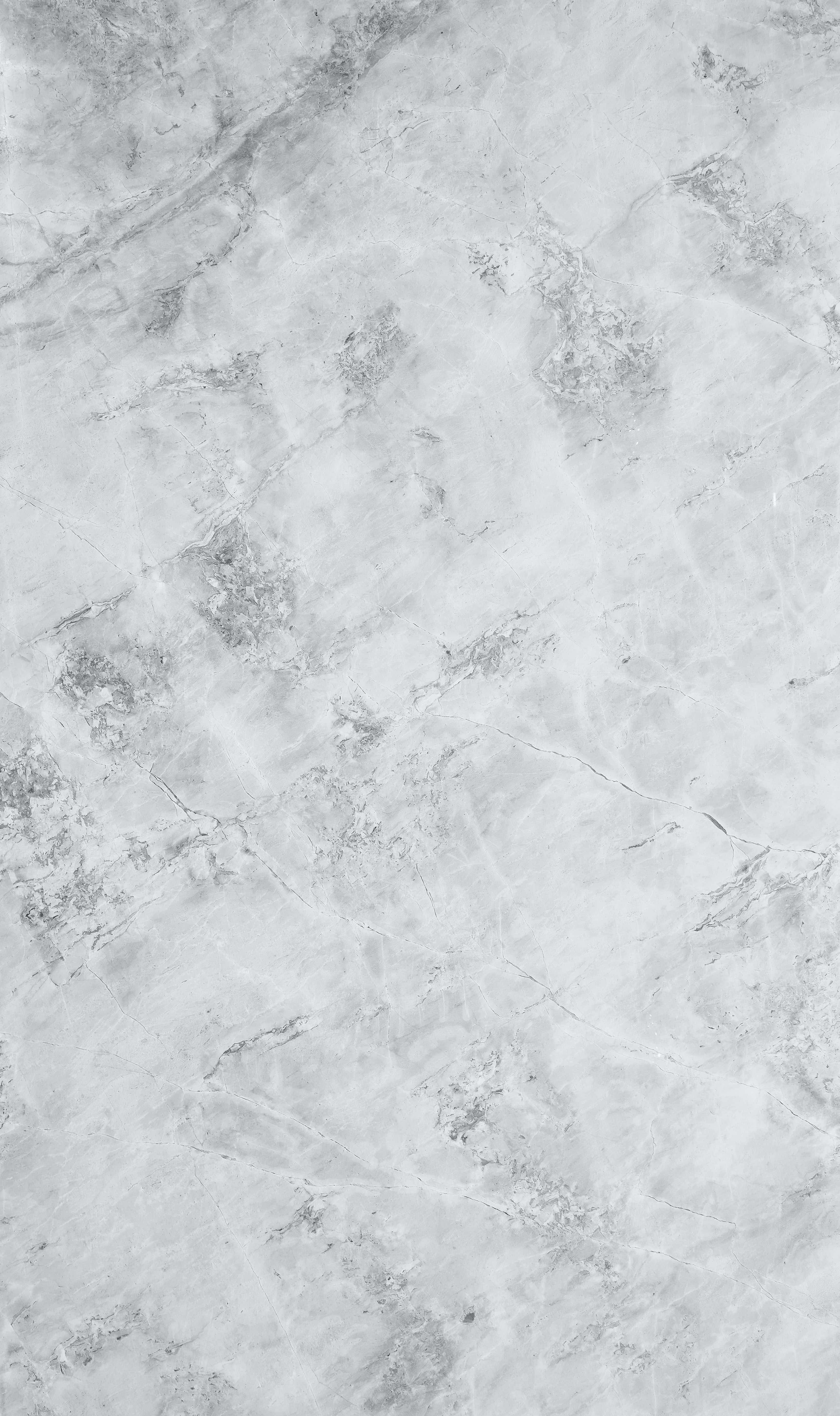 Aesthetic Gray 桌布 壁紙 — 淺灰色大理石表面的特寫，帶有細微紋理和天然石材質感。