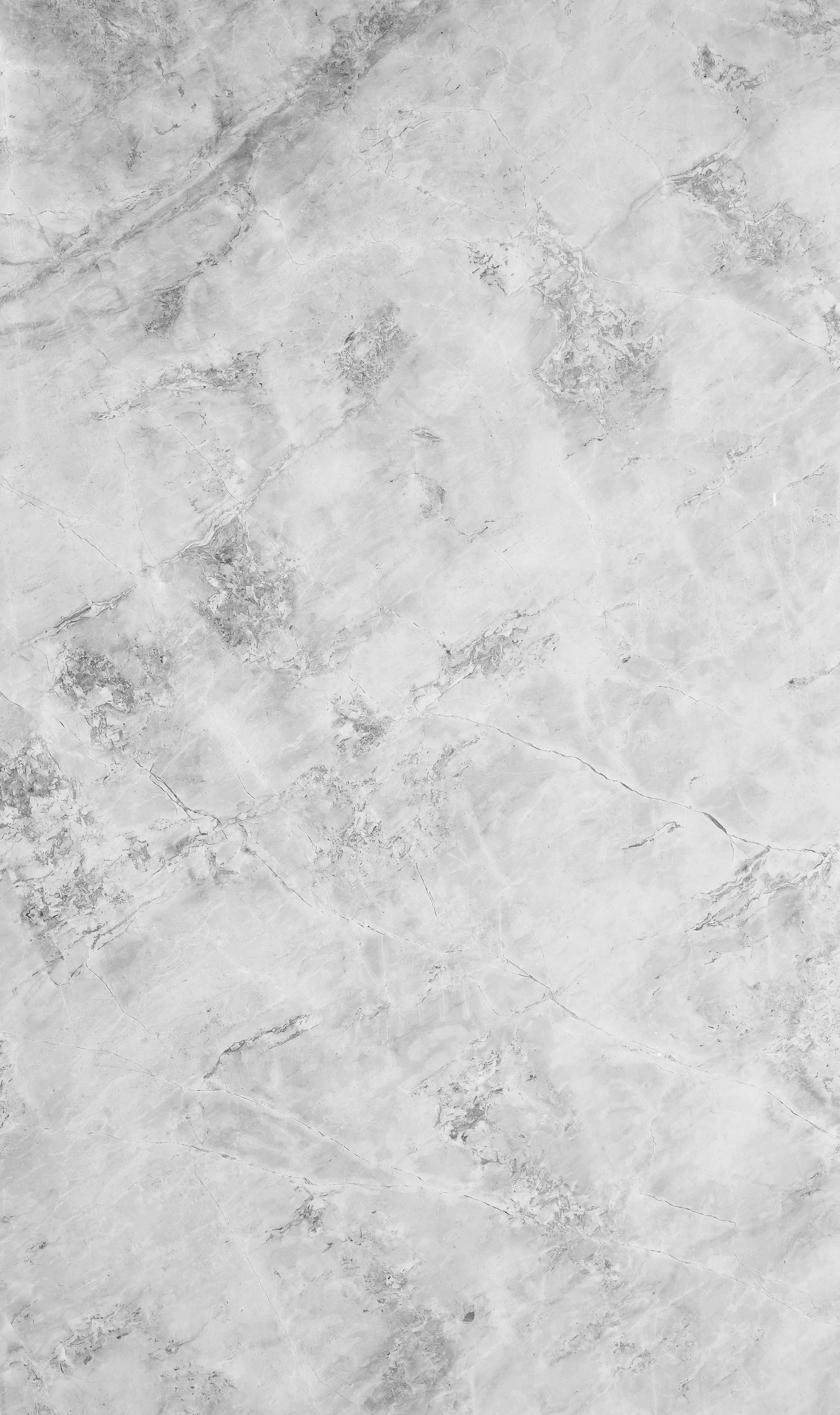 Marble Macbook 桌布 壁紙 — 淺灰色大理石表面的特寫，帶有細微紋理和天然石材質感。