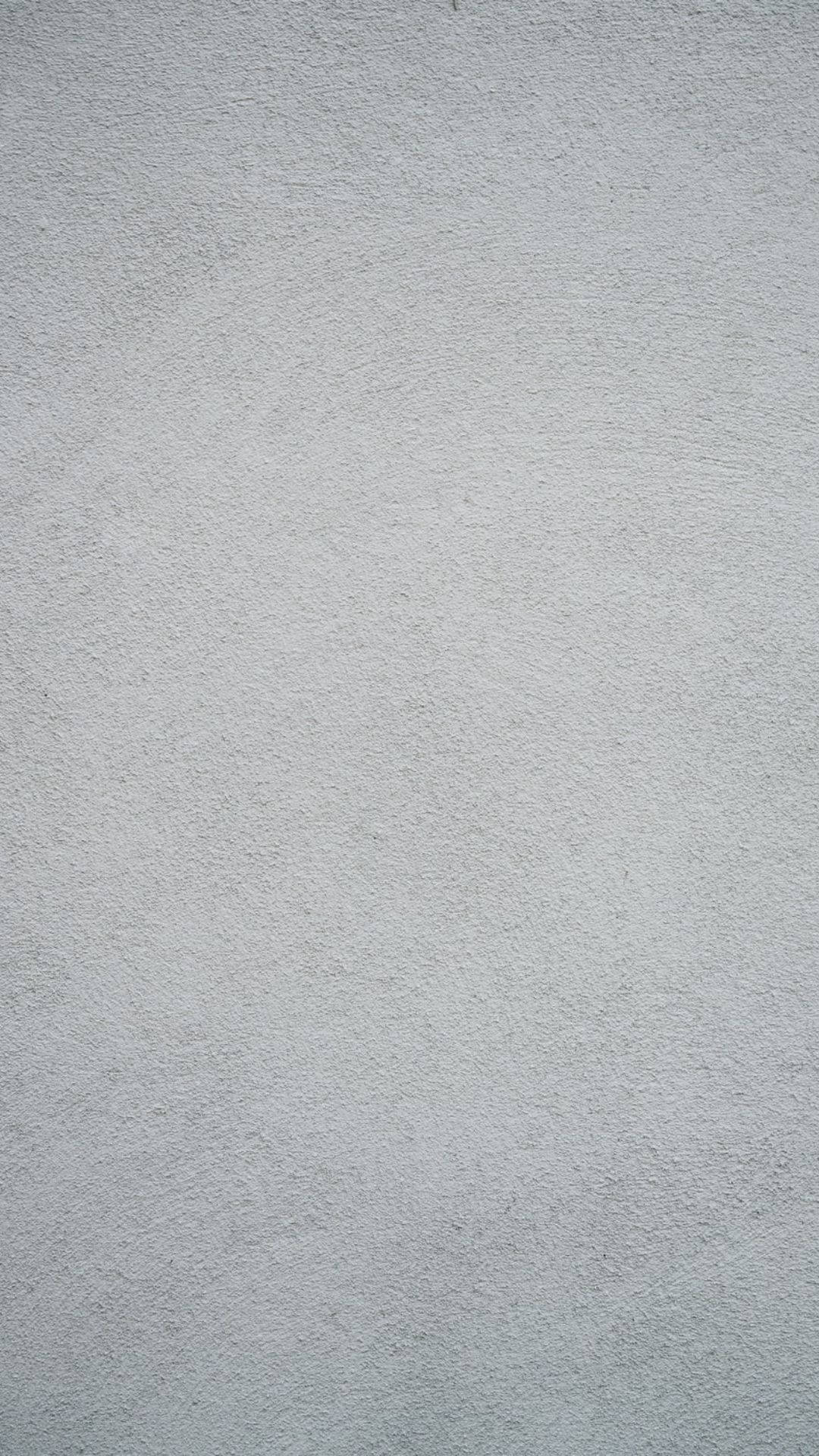 Solid 桌布 壁紙 — 淺灰色平滑紋理牆面特寫，色調和細微顆粒變化微妙。