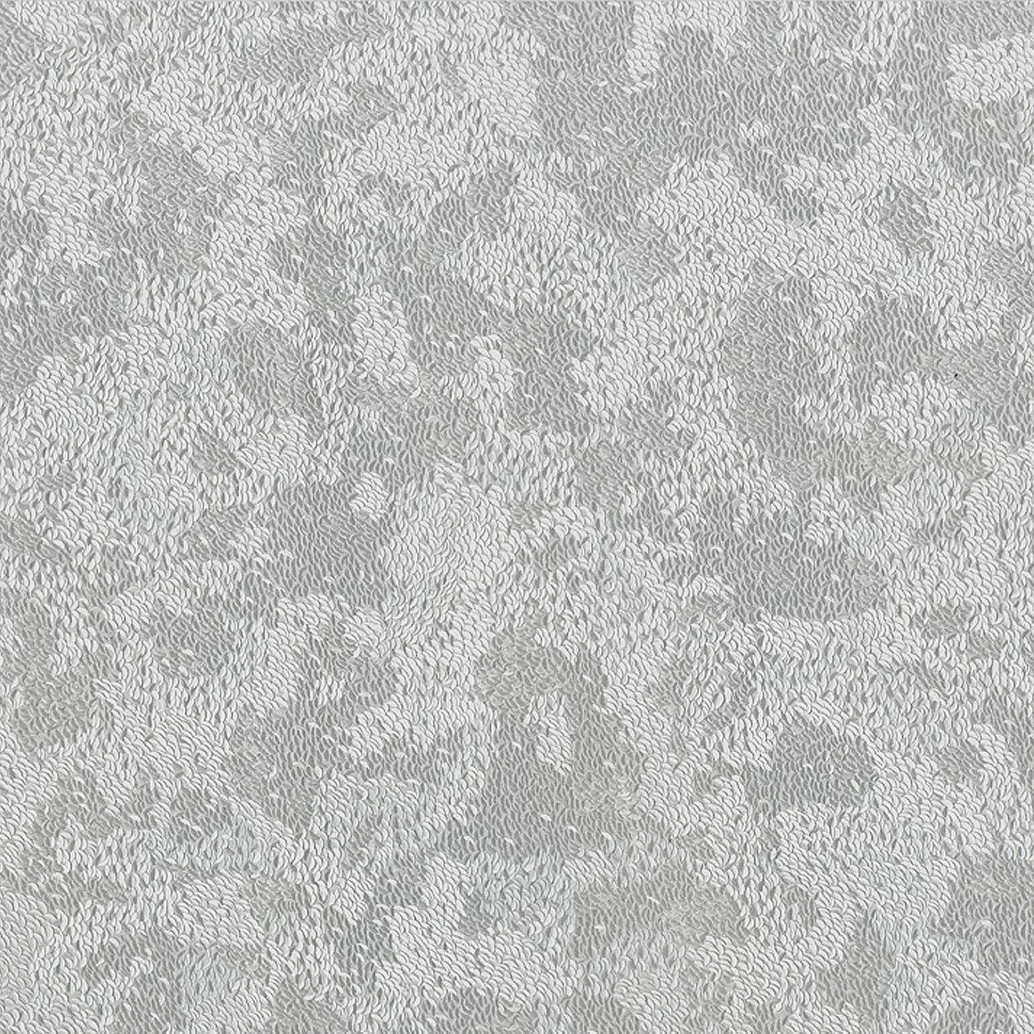 Textured 桌布 壁紙 — 淺灰色紋理壁紙的特寫，帶有微妙的重复花卉圖案。