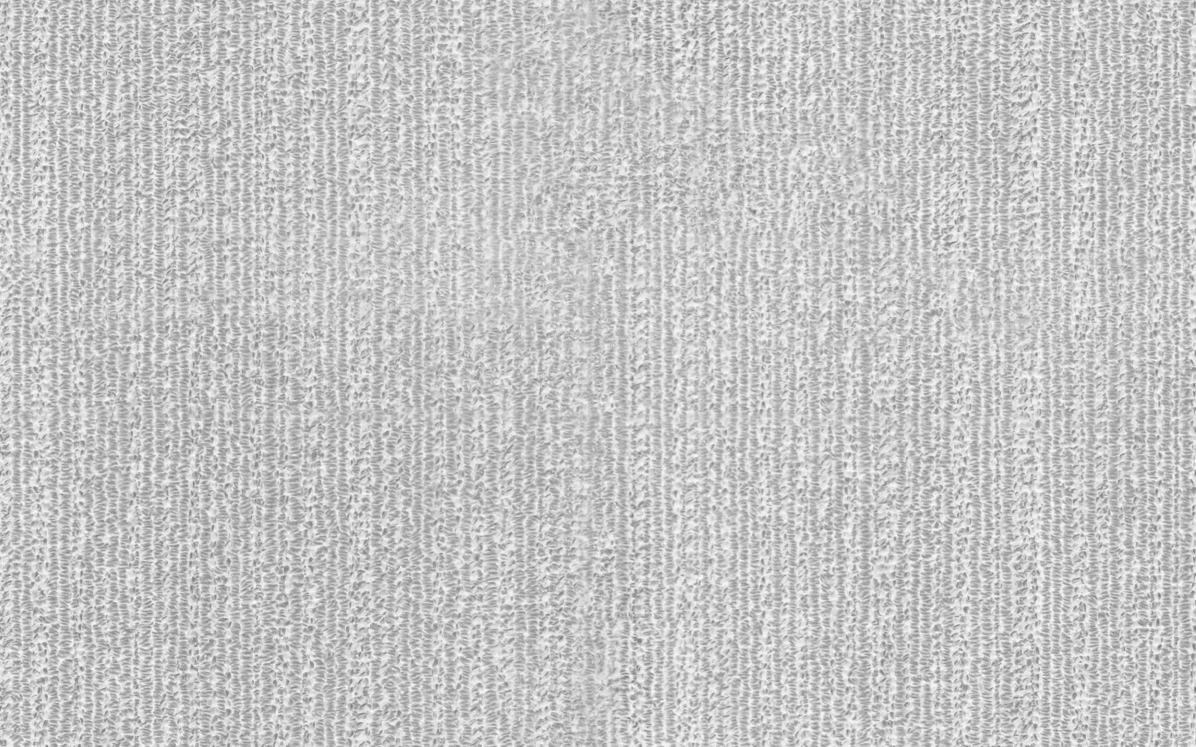 Textured 桌布 壁紙 — 淺灰色紋理布料的特寫，垂直編織纖維營造出柔軟的觸感圖案。