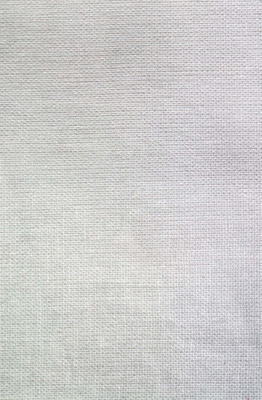 Textured 桌布 壁紙 — 淺灰色紋理布料的特寫，細緻的編織線條形成微妙的網格圖案。