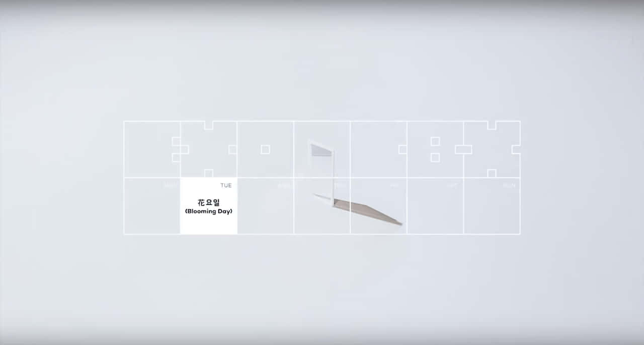 桌布 壁紙 — 淺灰色背景上帶有韓文文字和幾何形狀的簡約數位日曆介面。