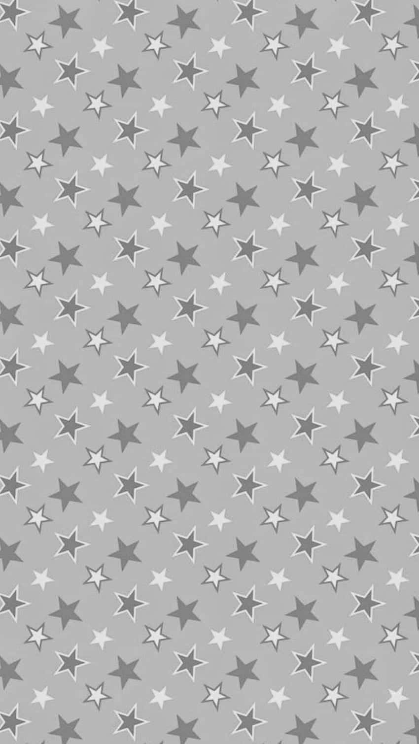 Stars 桌布 壁紙 — 淺灰色背景上重複的灰色和白色星星圖案，營造出微妙的幾何壁紙設計。