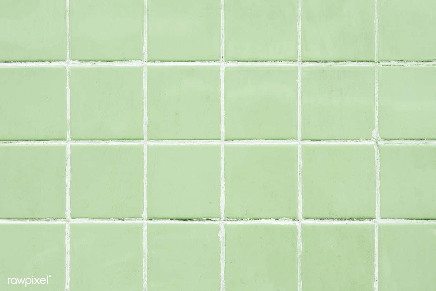 Tile 桌布 壁紙 — 淺綠色方形瓷磚的特寫，白色填縫線形成整齊的網格圖案。