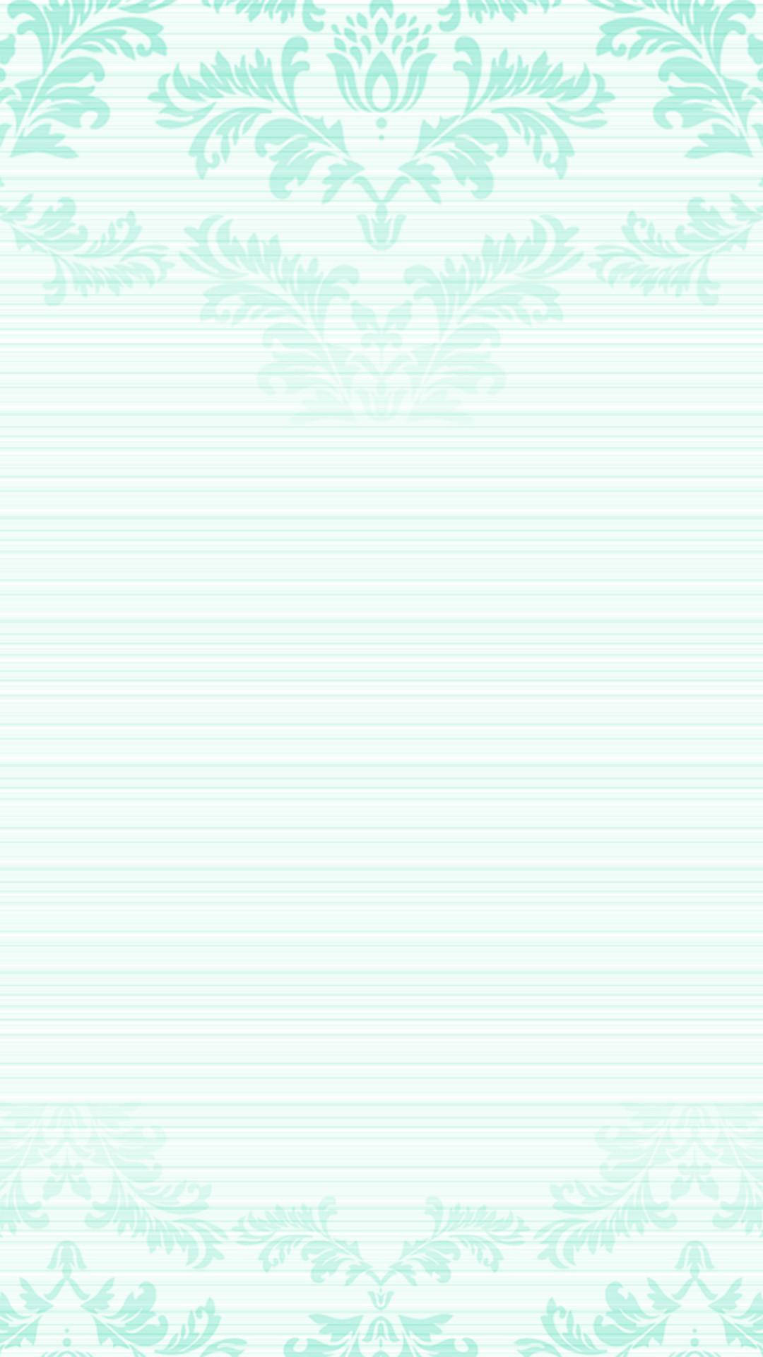 Mint Green iPhone 桌布 壁紙 — 淺薄荷綠色壁紙，頂部和底部有精緻的大馬士革花卉圖案，背景帶有微妙的條紋。