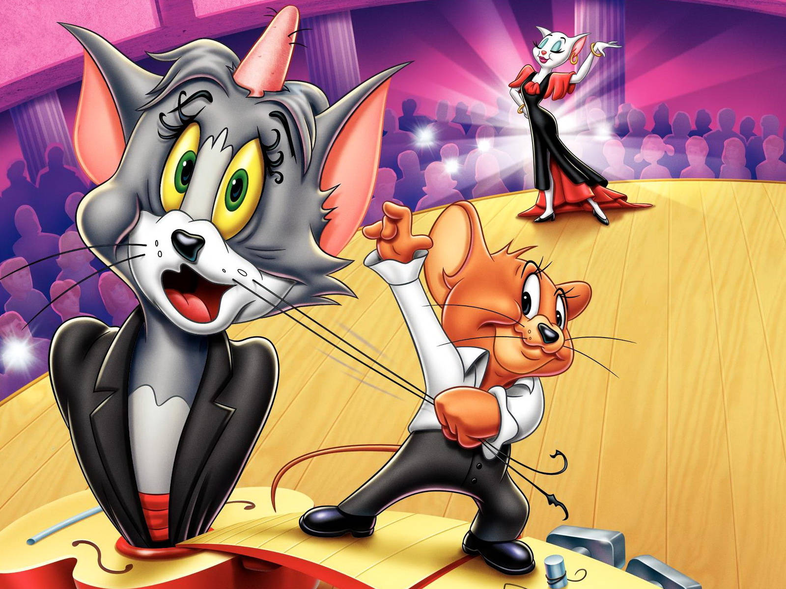 tom and jerry iPhone 桌布 壁紙 — 湯姆和傑瑞在燈光明亮的舞台上表演喜劇舞蹈，背景有歡呼的觀眾。