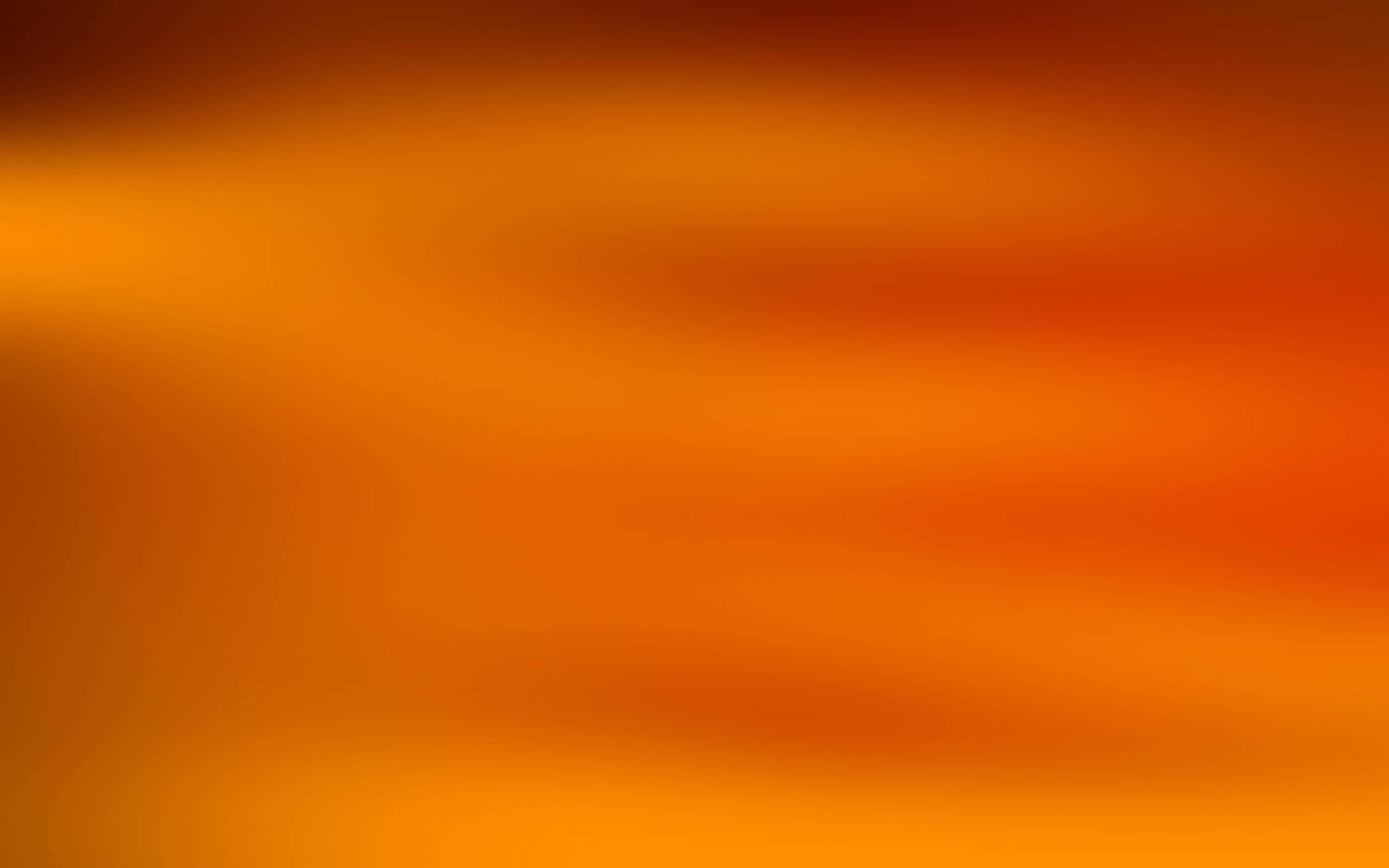 Light Orange 桌布 壁紙 — 溫暖橙色和琥珀色調的平滑漸變，柔和地融合在整個畫面中。