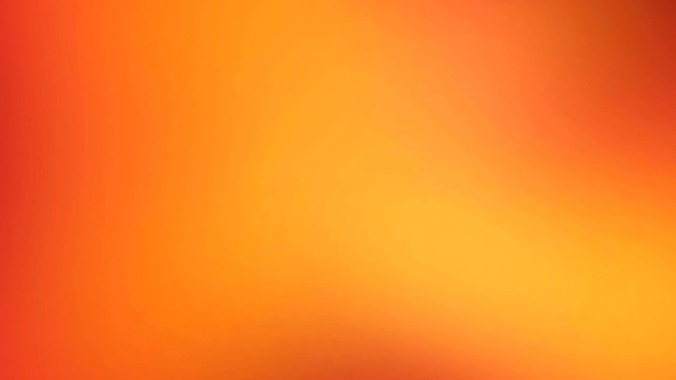 漸層 桌布 壁紙 — 溫暖橙色和紅色色調的平滑漸變，柔和地融合在整個畫面中。