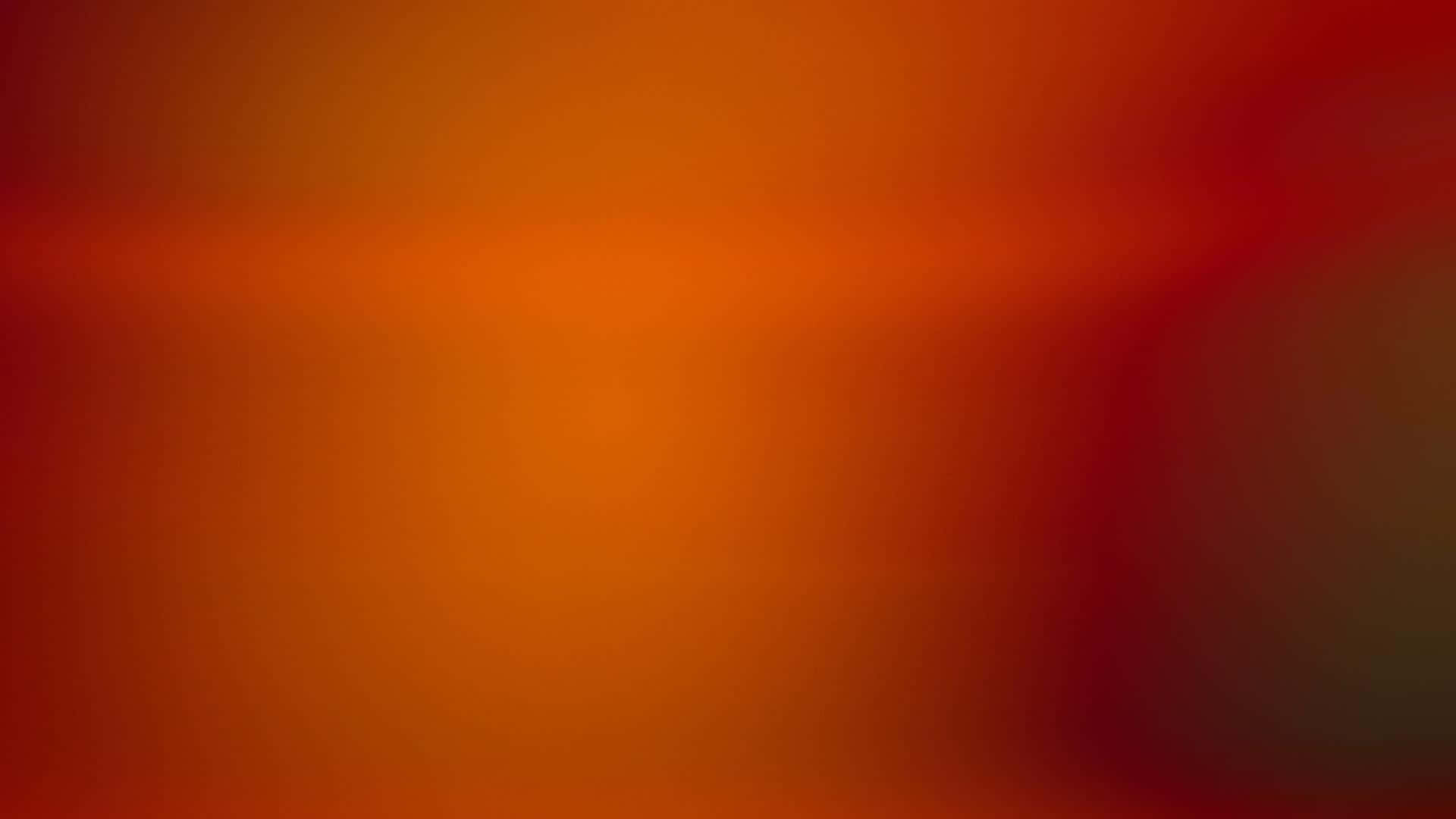 背景 桌布 壁紙 — 溫暖橙色與深紅色調柔和融合的平滑漸變，遍佈整個畫面。