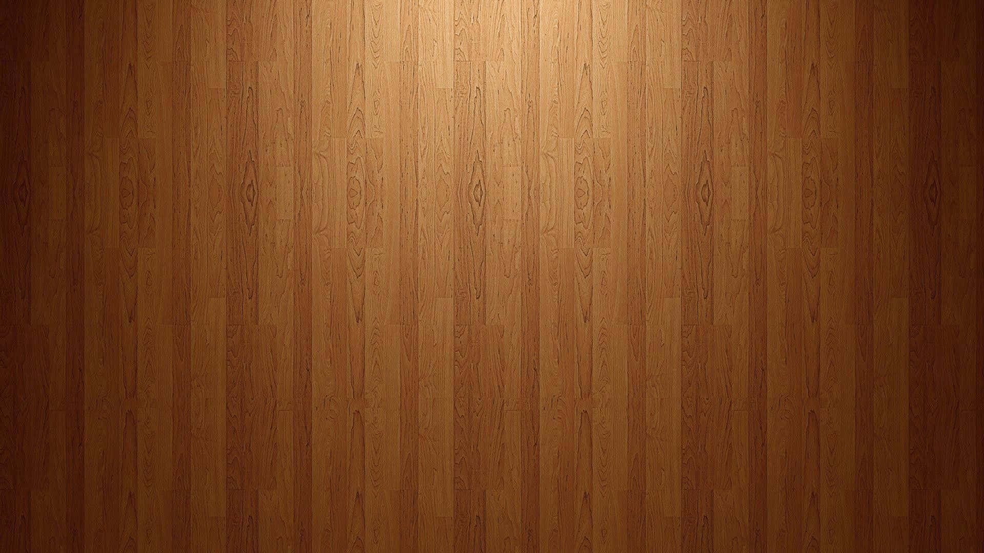 Wooden 桌布 壁紙 — 溫暖的木地板，帶有天然木紋圖案，從上方以柔和漸變燈光照射。