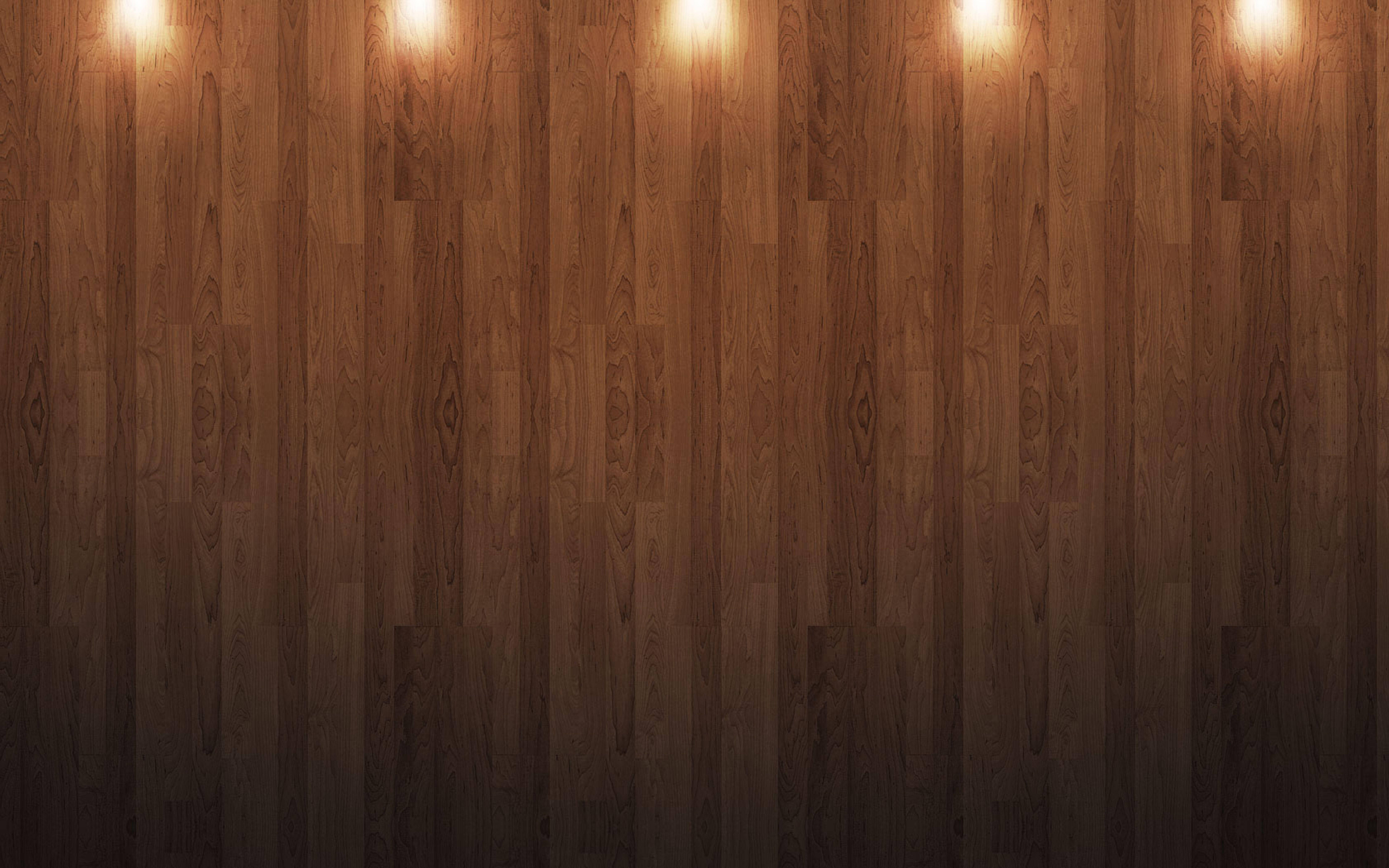 Wood Texture 桌布 壁紙 — 溫暖的木地板被柔和的天花燈光照亮，營造出舒適的環境光。