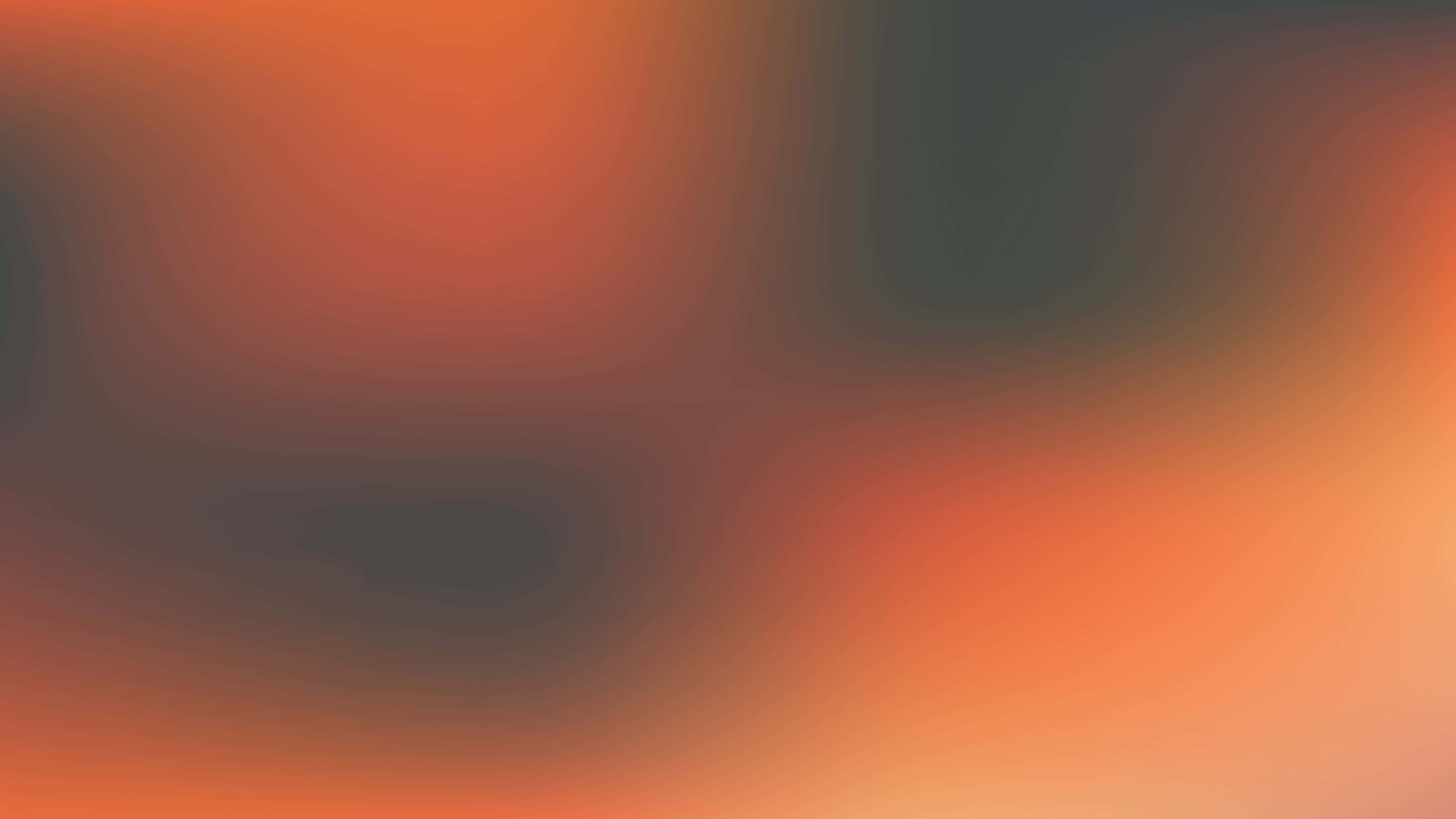 Flare 桌布 壁紙 — 溫暖的橙色與深灰色在畫布上柔和融合的平滑漸變。