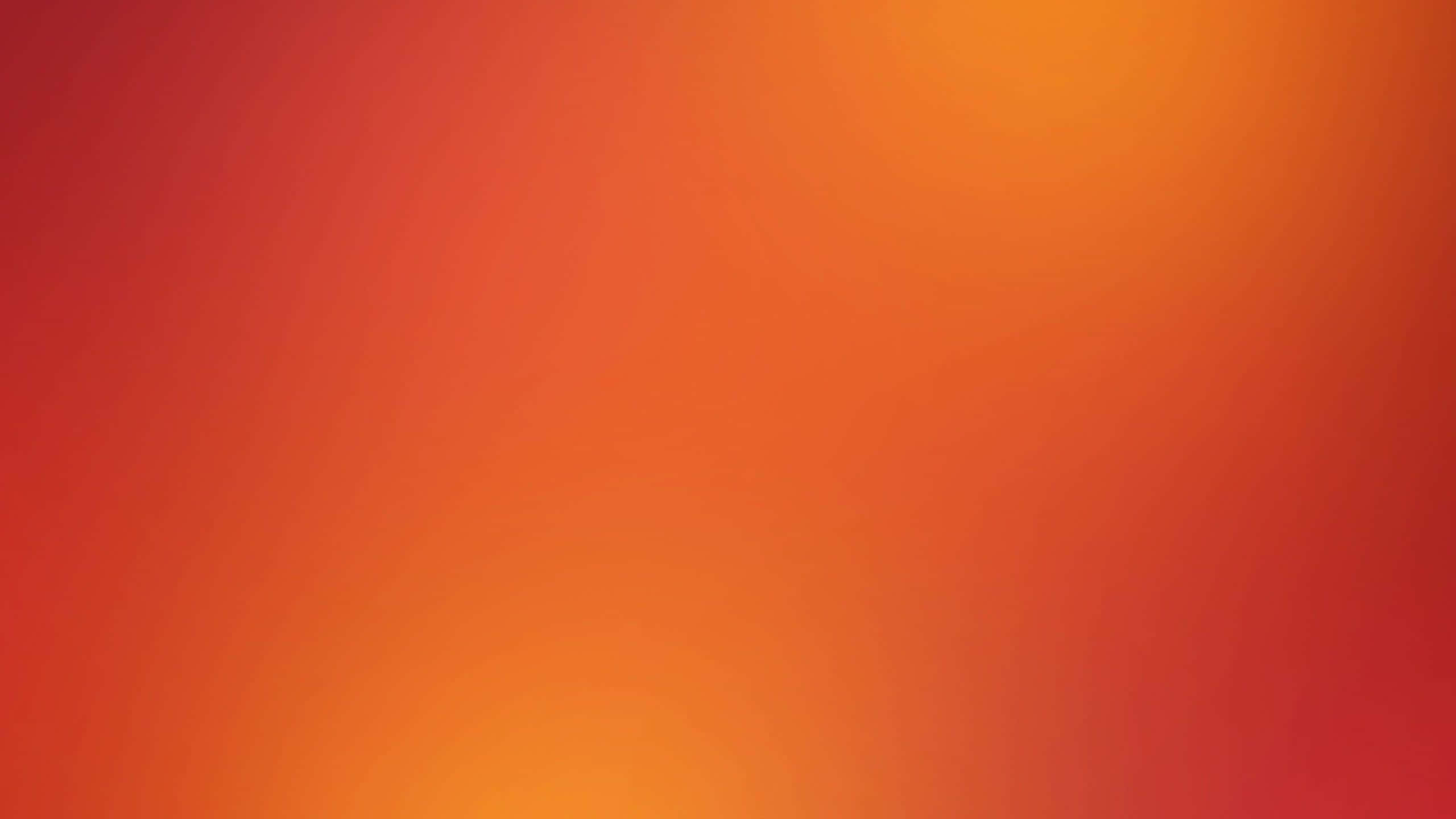 Orange Gradient 桌布 壁紙 — 溫暖的紅色和橙色平滑漸變，柔和地融合在整個畫面中。
