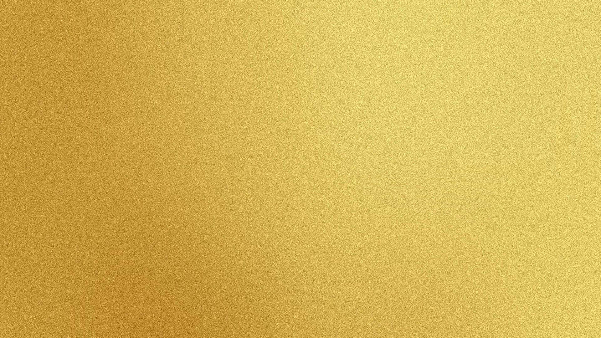 Gold Abstract 桌布 壁紙 — 溫暖金色調的平滑漸變，帶有細微紋理，營造出奢華優雅的背景。