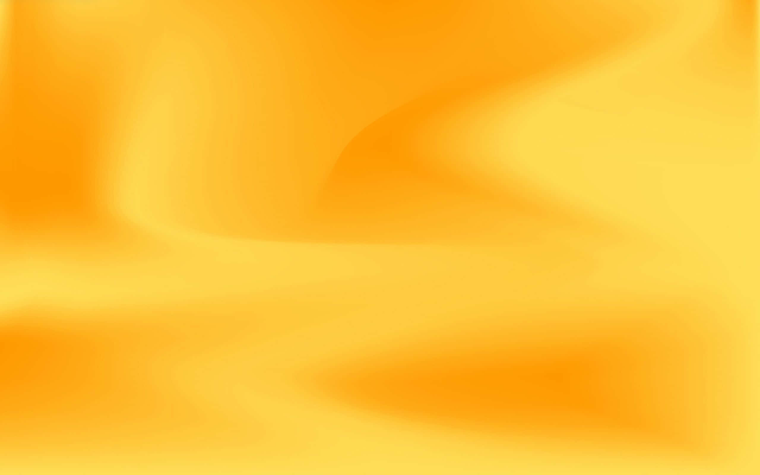 Yellow Abstract 桌布 壁紙 — 溫暖黃色和橙色色調的平滑漸變，像液體光一樣在畫布上流動。