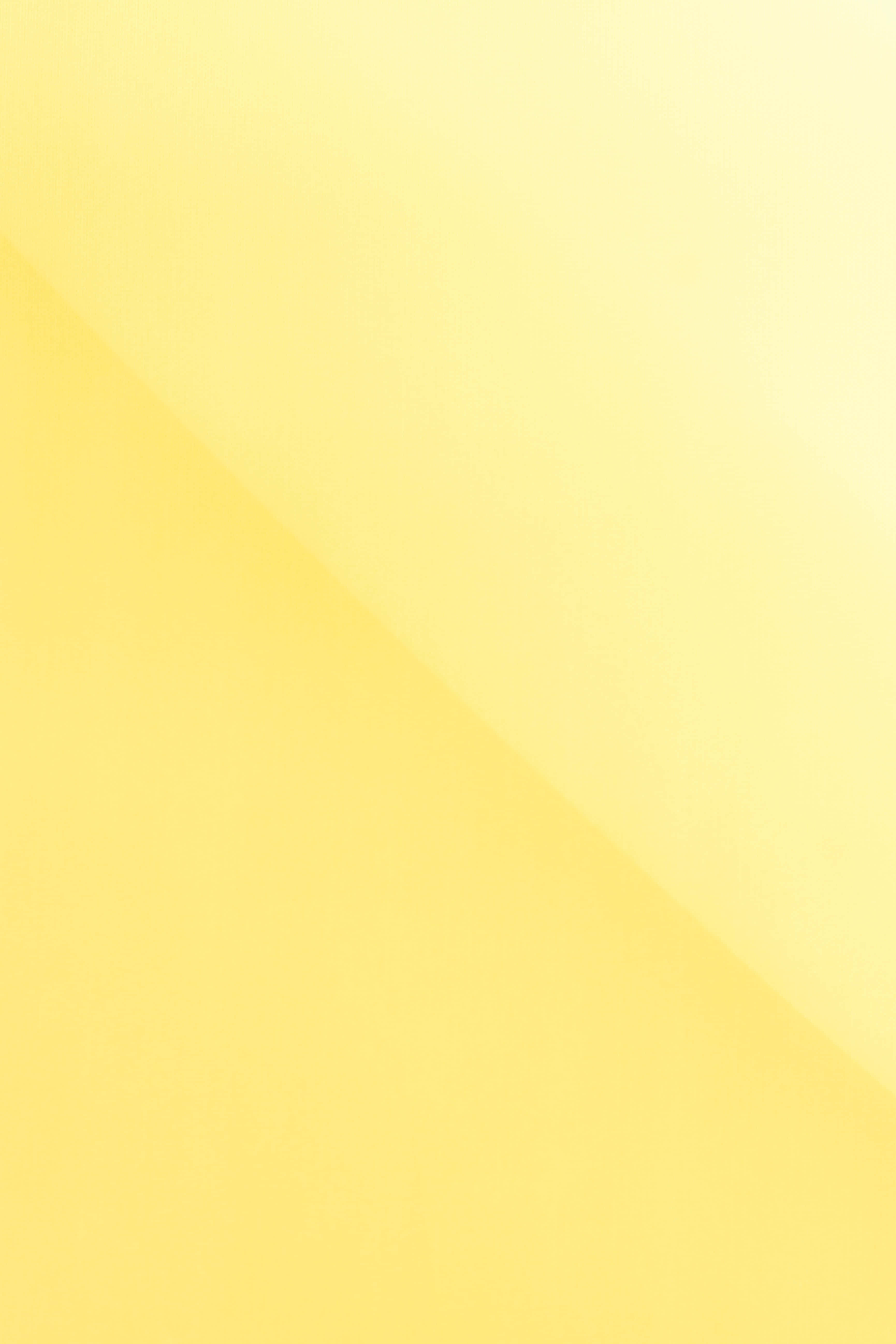 Pale Yellow 桌布 壁紙 — 溫暖黃色調的柔和漸層沿對角線流過光滑簡約的表面。