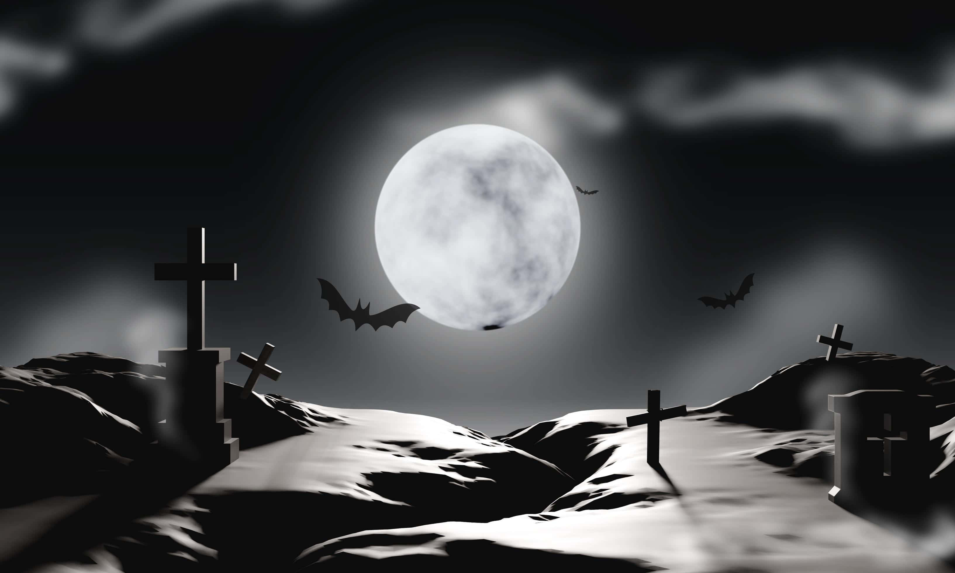 Cemetery 桌布 壁紙 — 滿月下一個陰森的墓地，蝙蝠飛舞，墓碑在烏雲襯托下呈現剪影。