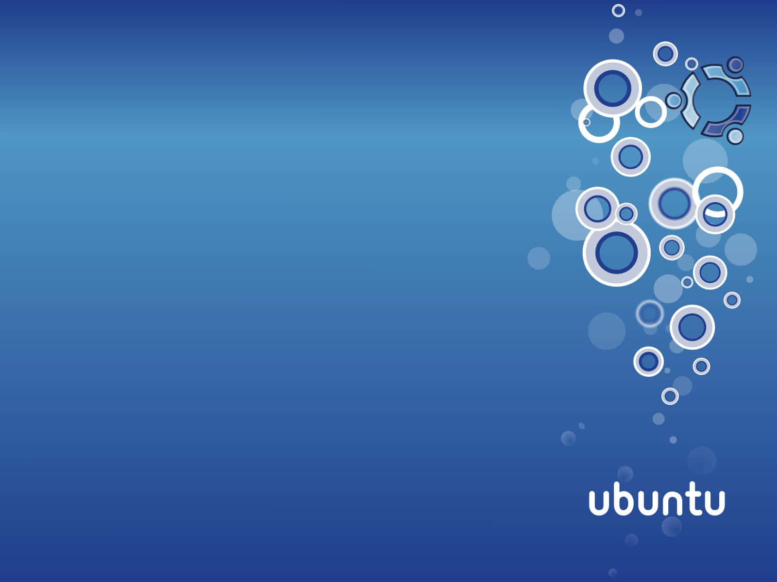 ubuntu 桌布 壁紙 — 漸變藍色背景，帶有浮動的白色圓圈和右下角的Ubuntu標誌。