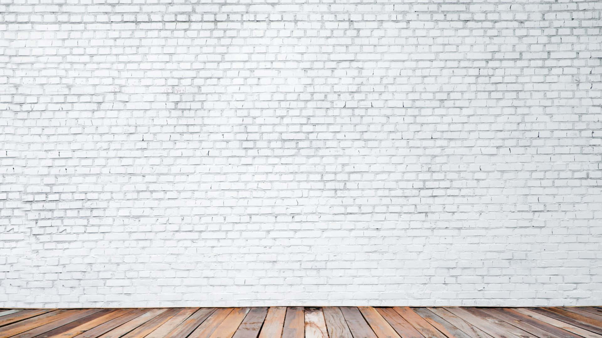 白色磚牆 桌布 壁紙 — 潔白的磚牆與溫暖的木地板在簡約的室內空間中相遇。