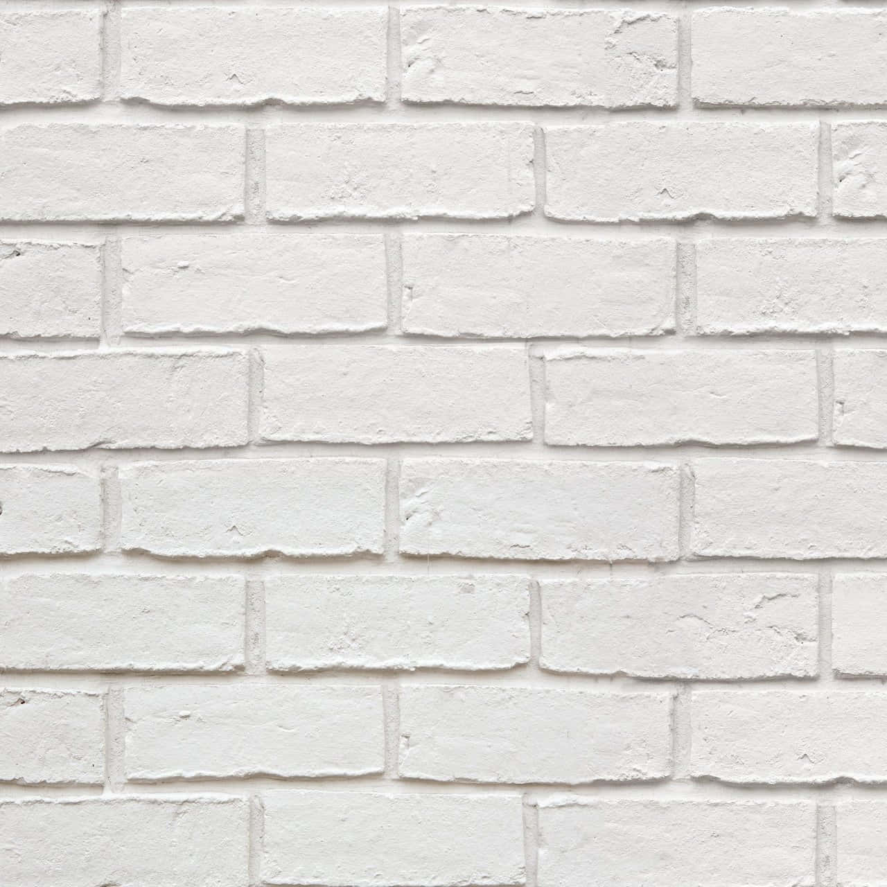 wall 桌布 壁紙 — 潔白磚牆的特寫，帶有紋理水泥線條和細微瑕疵。