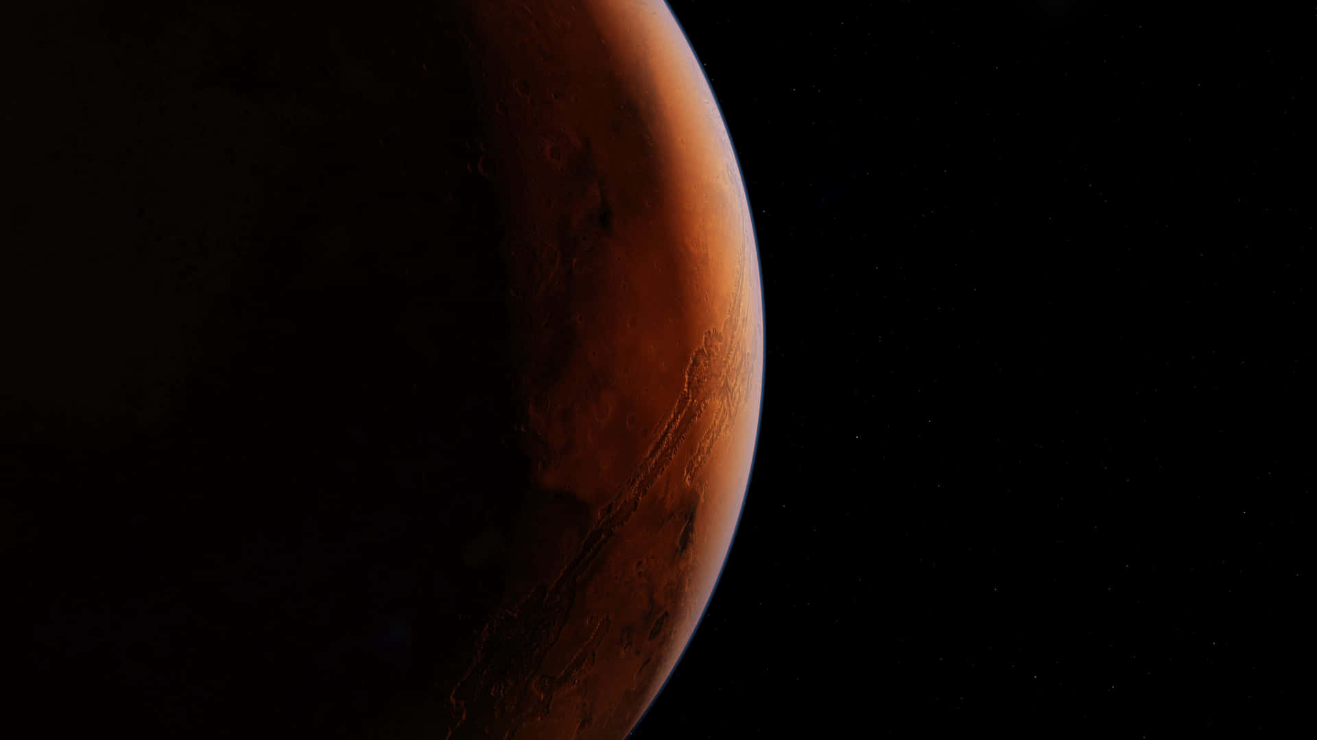  壁紙 — 火星在深空中發光的戲劇性特寫，可見表面紋理和星空背景。