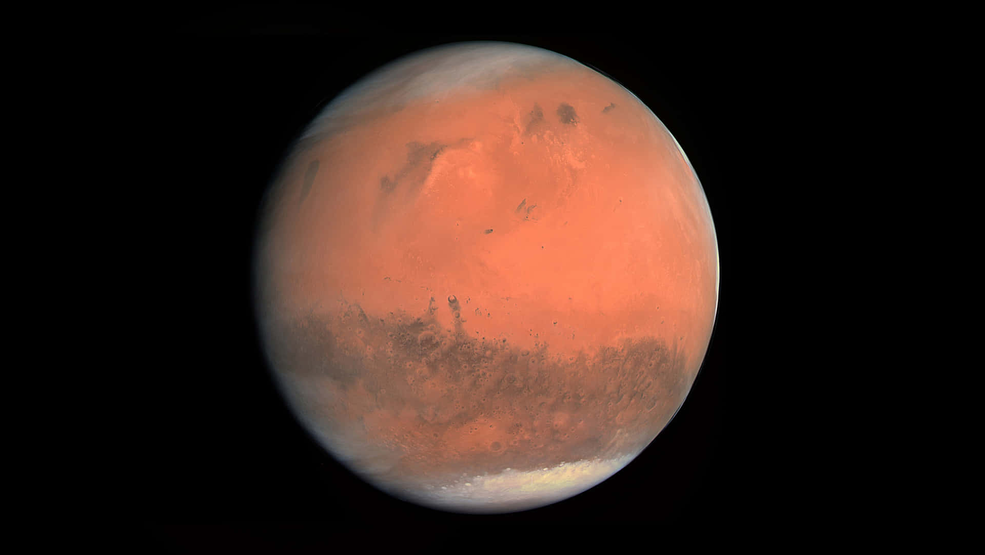 火星，橙色表面和極地冰蓋，背景為黑色太空。 — 太陽系 GIF 壁紙
