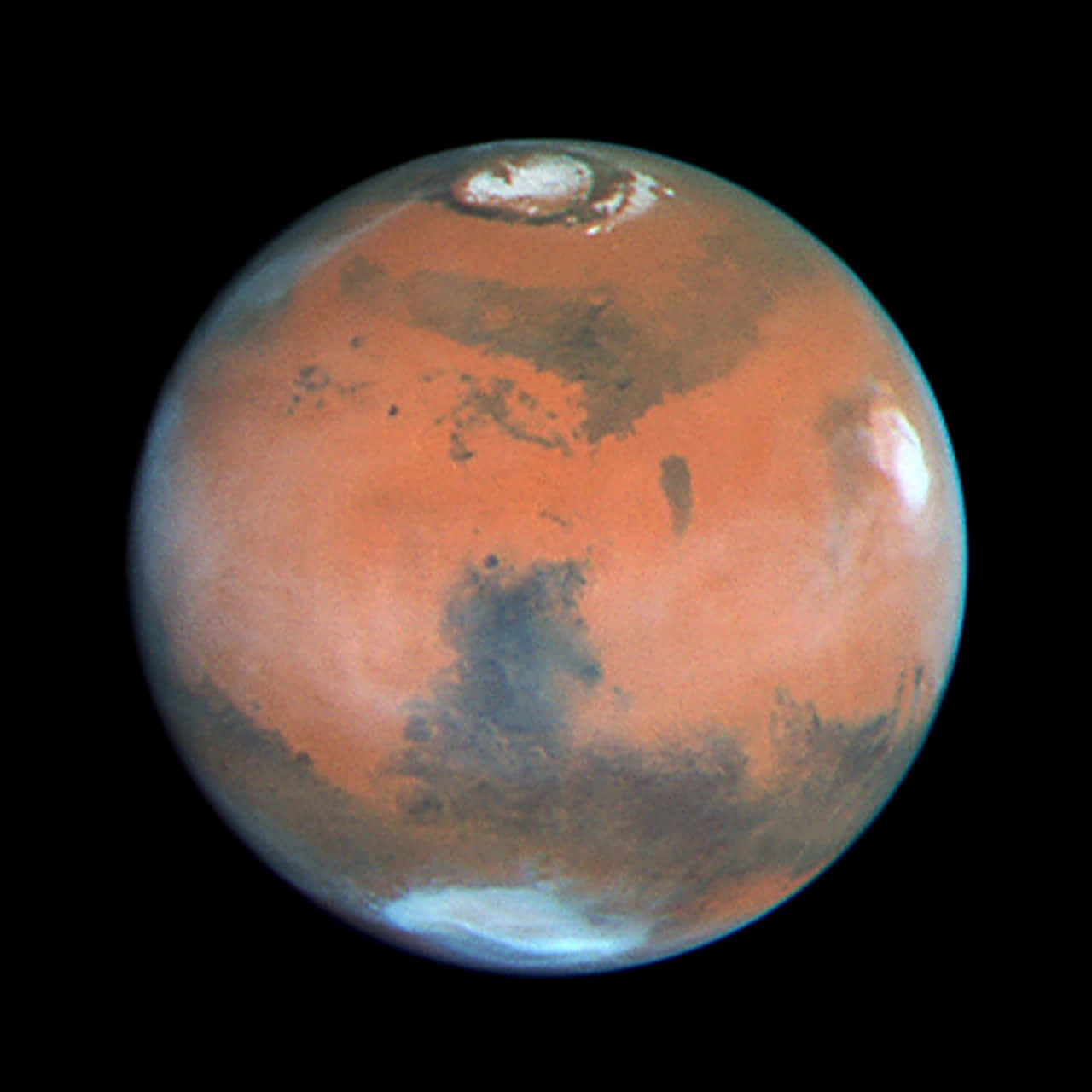 行星動畫 桌布 壁紙 — 火星的鮮明景象，展示其鏽橙色表面，帶有黑色斑點和極地冰蓋，背景是黑色的太空虛空。