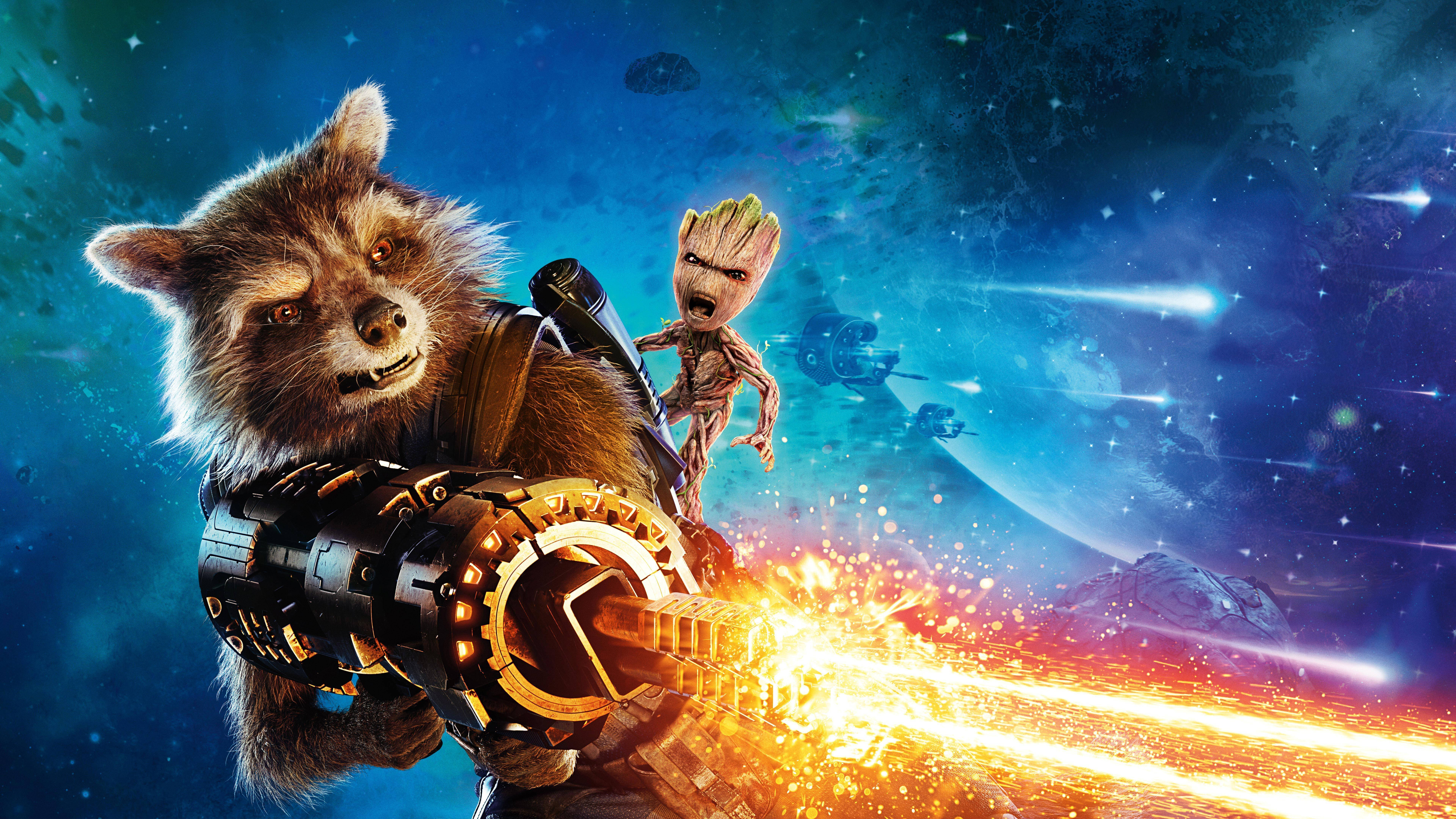 Baby Groot 桌布 壁紙 — 火箭浣熊發射熾熱武器，格魯特在他旁邊大喊，背景是星光燦爛的宇宙。