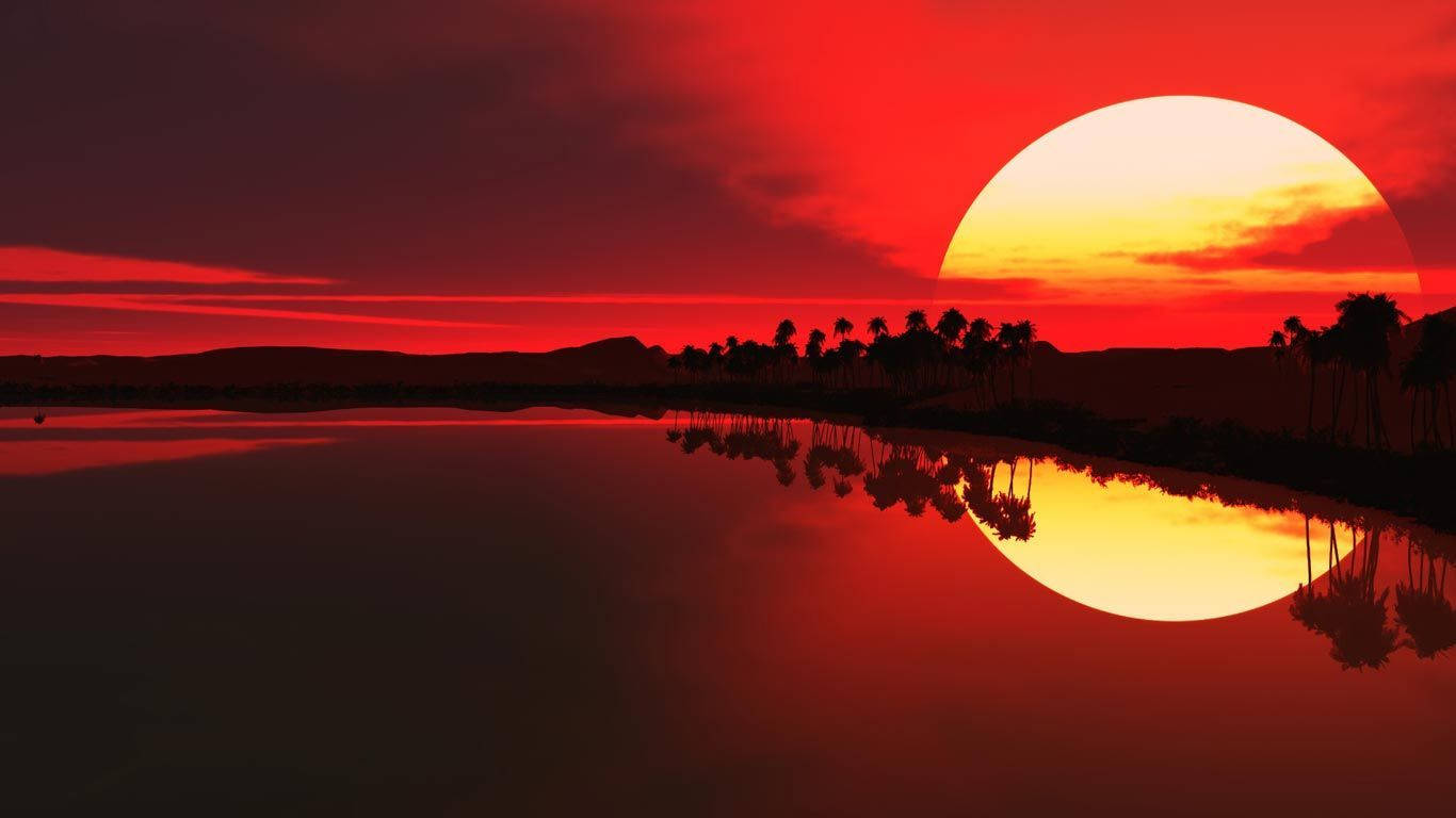 筆電 桌布 壁紙 — 火紅的夕陽在平靜的水面上投射出閃爍的倒影，襯托著棕櫚樹的剪影和遠山。