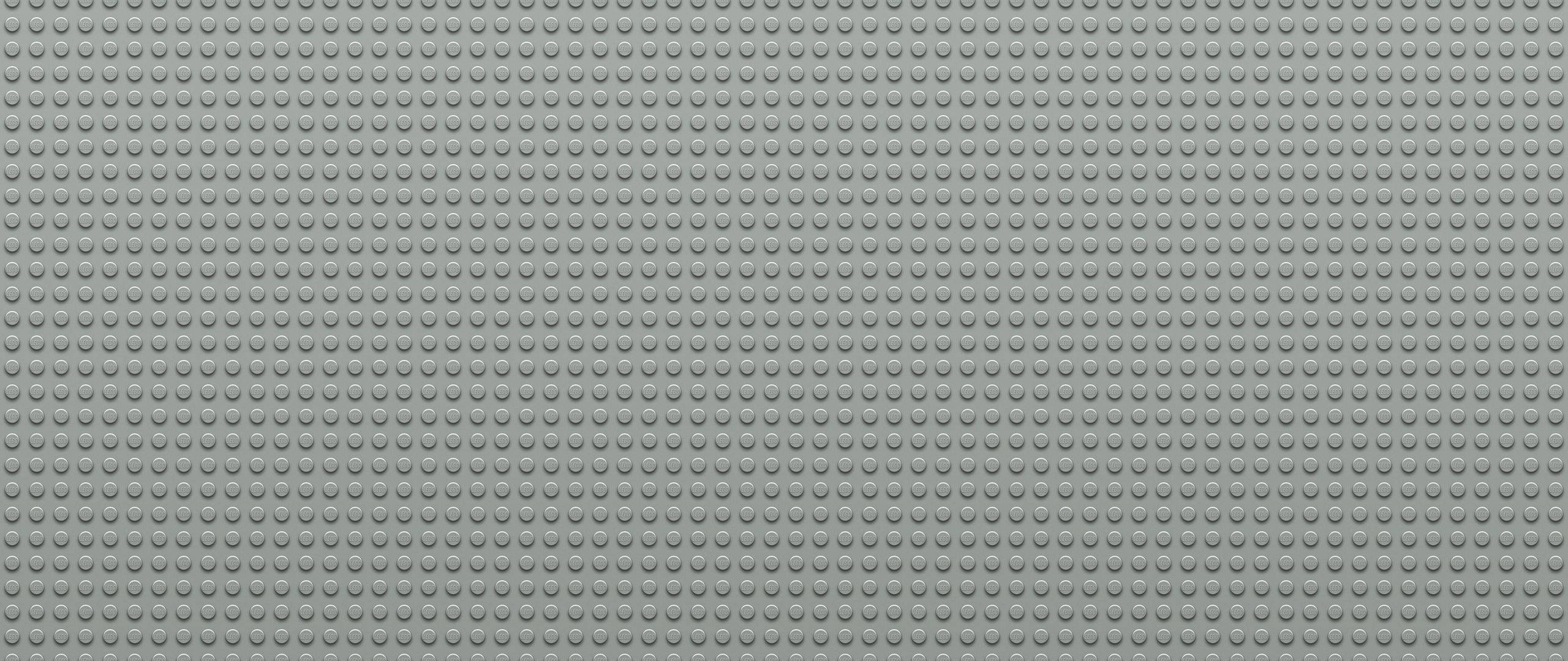 Light Gray 桌布 壁紙 — 灰色LEGO底板的特寫，帶有均勻的圓形凸點網格。