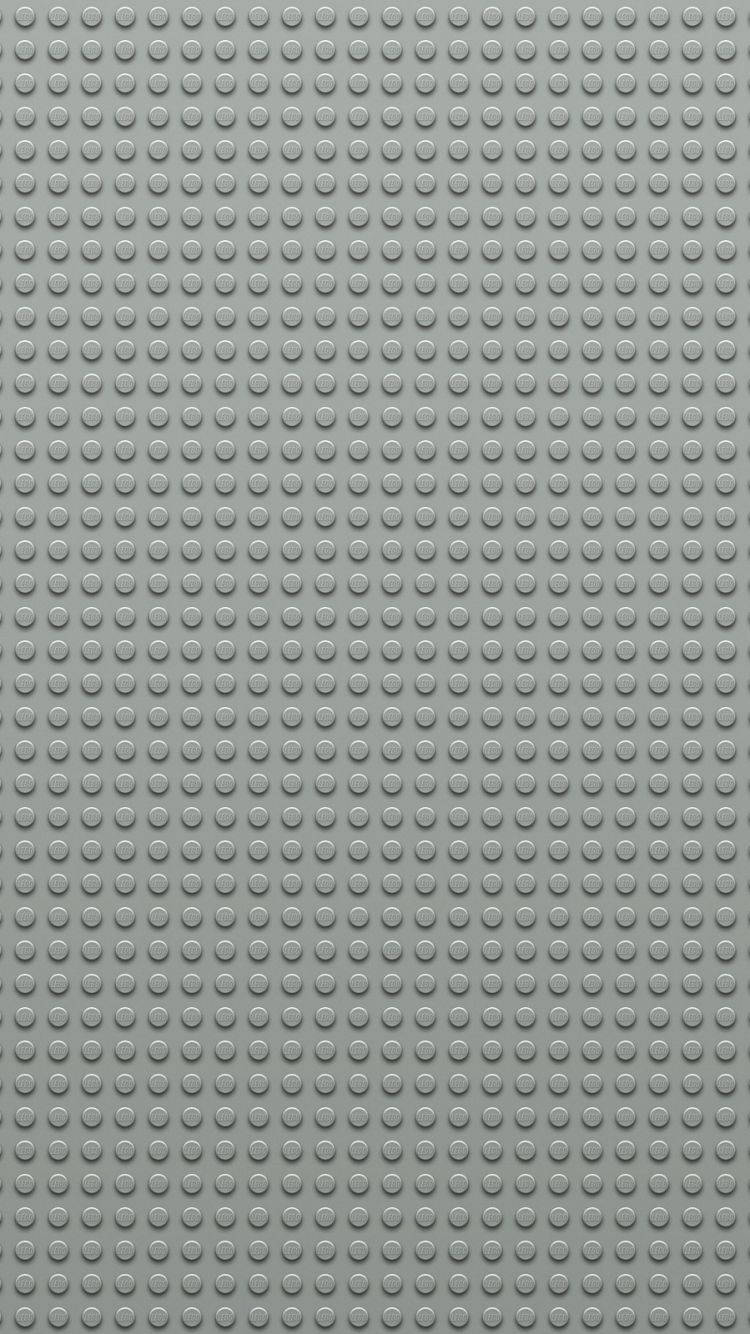 Light Gray 桌布 壁紙 — 灰色LEGO底板的特寫，帶有均勻網格的圓形凸點。