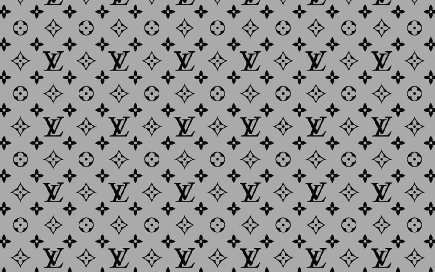 桌布 壁紙 — 灰色背景上重複的 Louis Vuitton 標誌和花卉圖案的單色圖案。