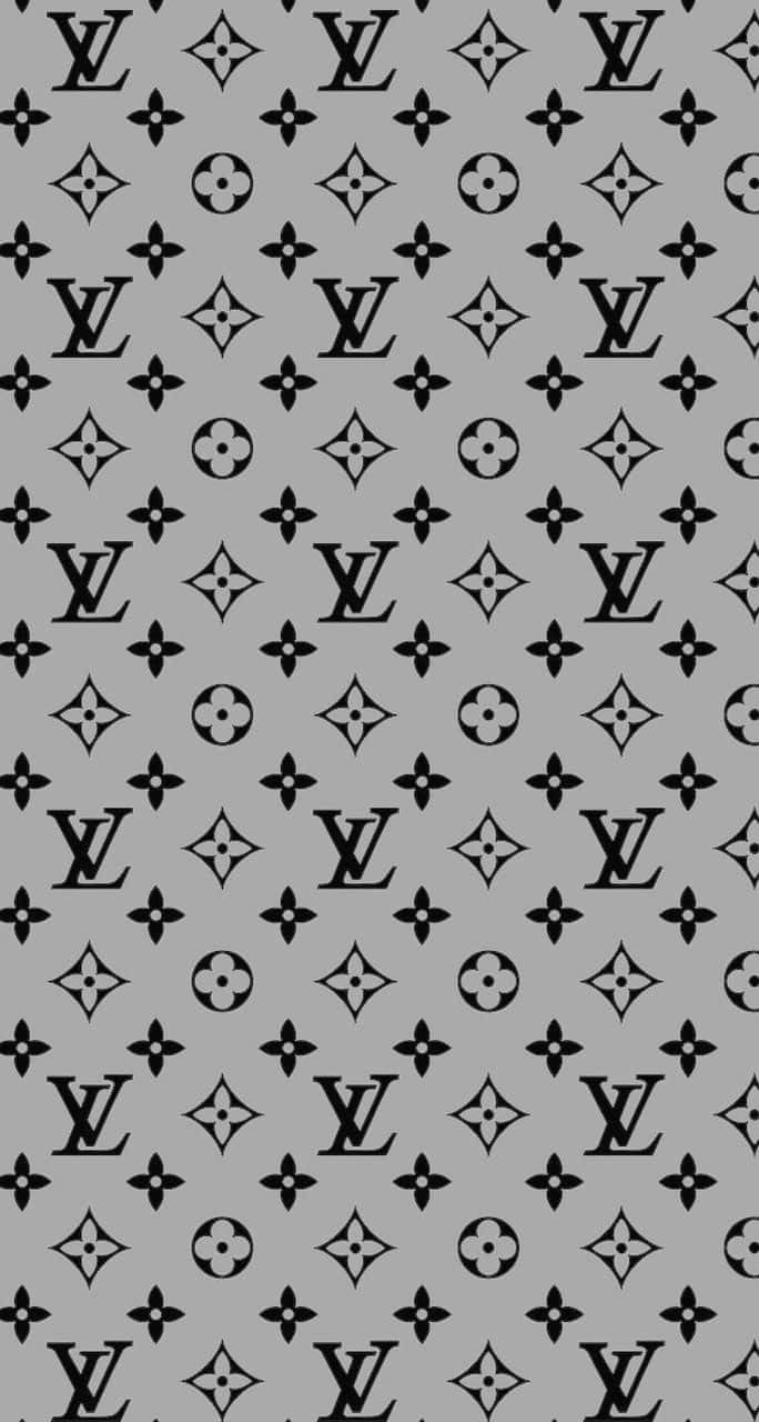 Louis Vuitton Pattern 桌布 壁紙 — 灰色背景上重複的 Louis Vuitton 標誌和花卉圖案的單色圖案。