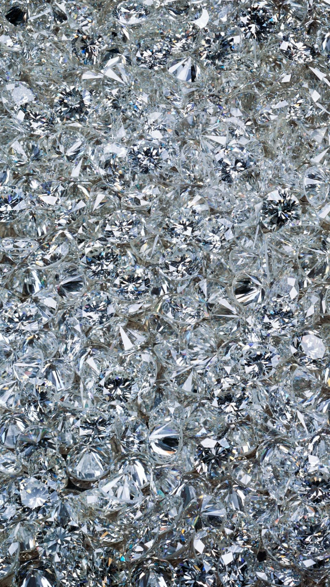 Textured 桌布 壁紙 — 無數閃爍鑽石在密集閃耀堆中捕捉光線的耀眼特寫。