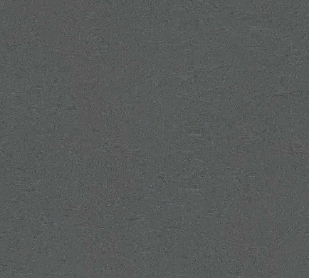 Dark Grey 桌布 壁紙 — 無縫深灰色紋理表面，帶有細微顆粒紋理和均勻照明。