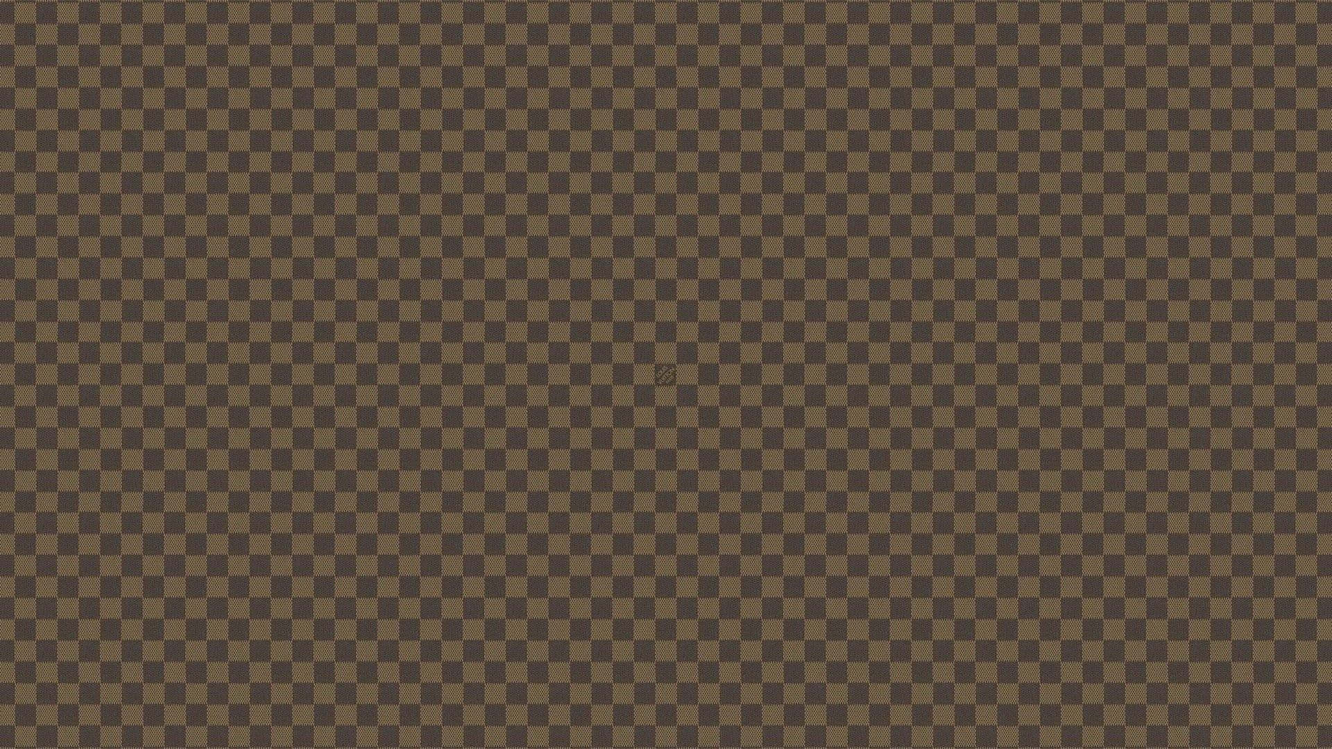 Monogram Desktop 桌布 壁紙 — 無縫的棕色和深棕色棋盤格圖案，帶有細微紋理和重複方格。