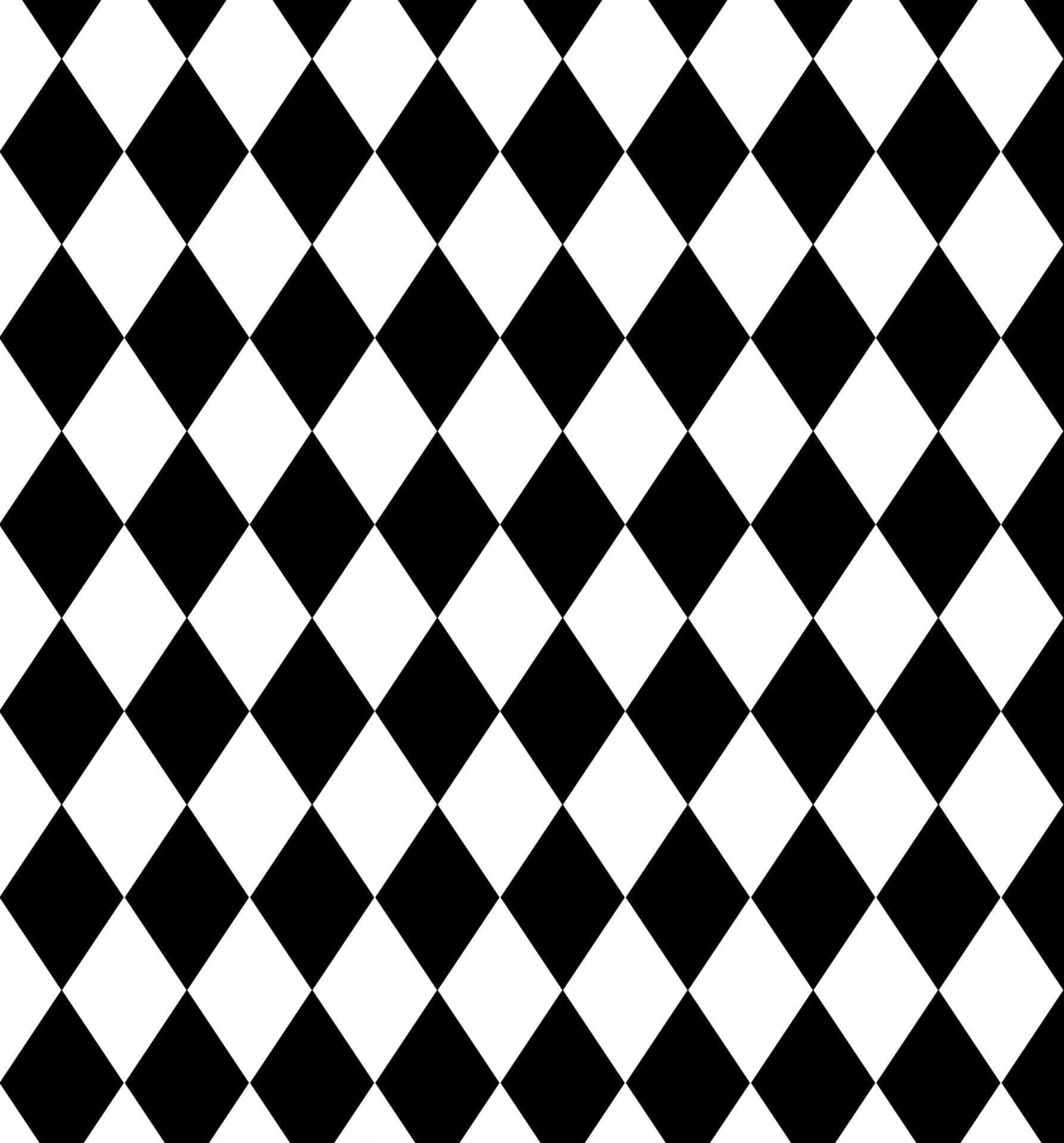 Black And White Pattern 桌布 壁紙 — 無縫的黑白菱形圖案創造出大膽的幾何壁紙，具有高對比度和重複對稱性。