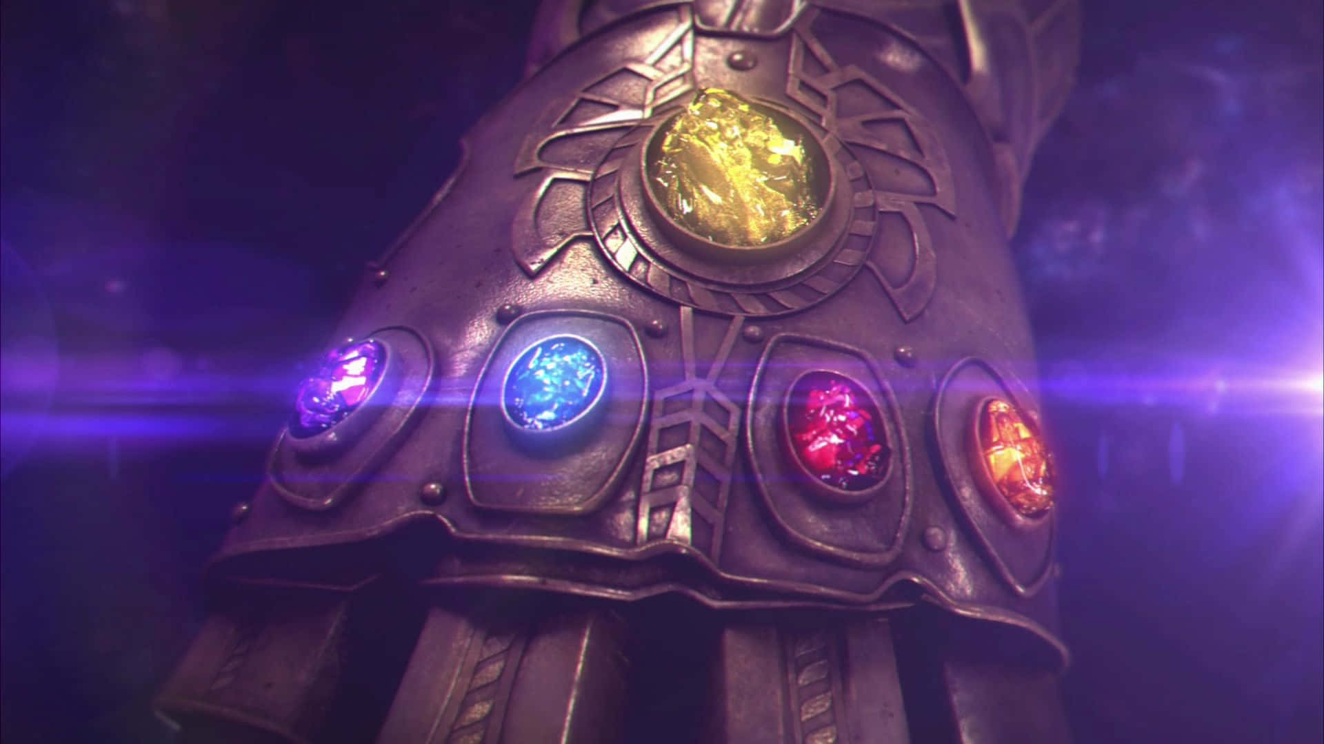 Power Stone 桌布 壁紙 — 無限手套的特寫，在深紫色宇宙背景上閃耀著六顆彩色寶石。