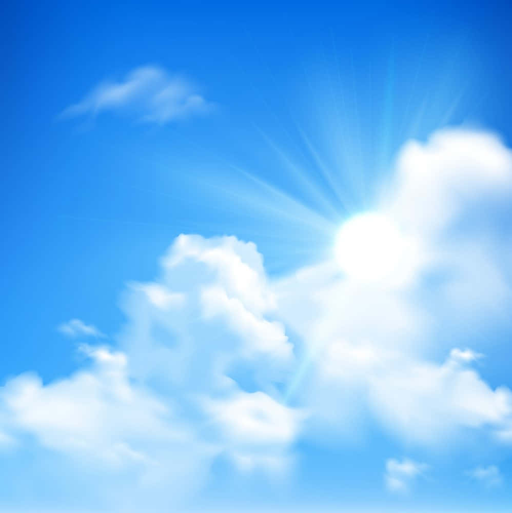 Cloudy 桌布 壁紙 — 燦爛的太陽穿過蓬鬆的白雲，在充滿活力的藍天下散發出明亮的光芒。