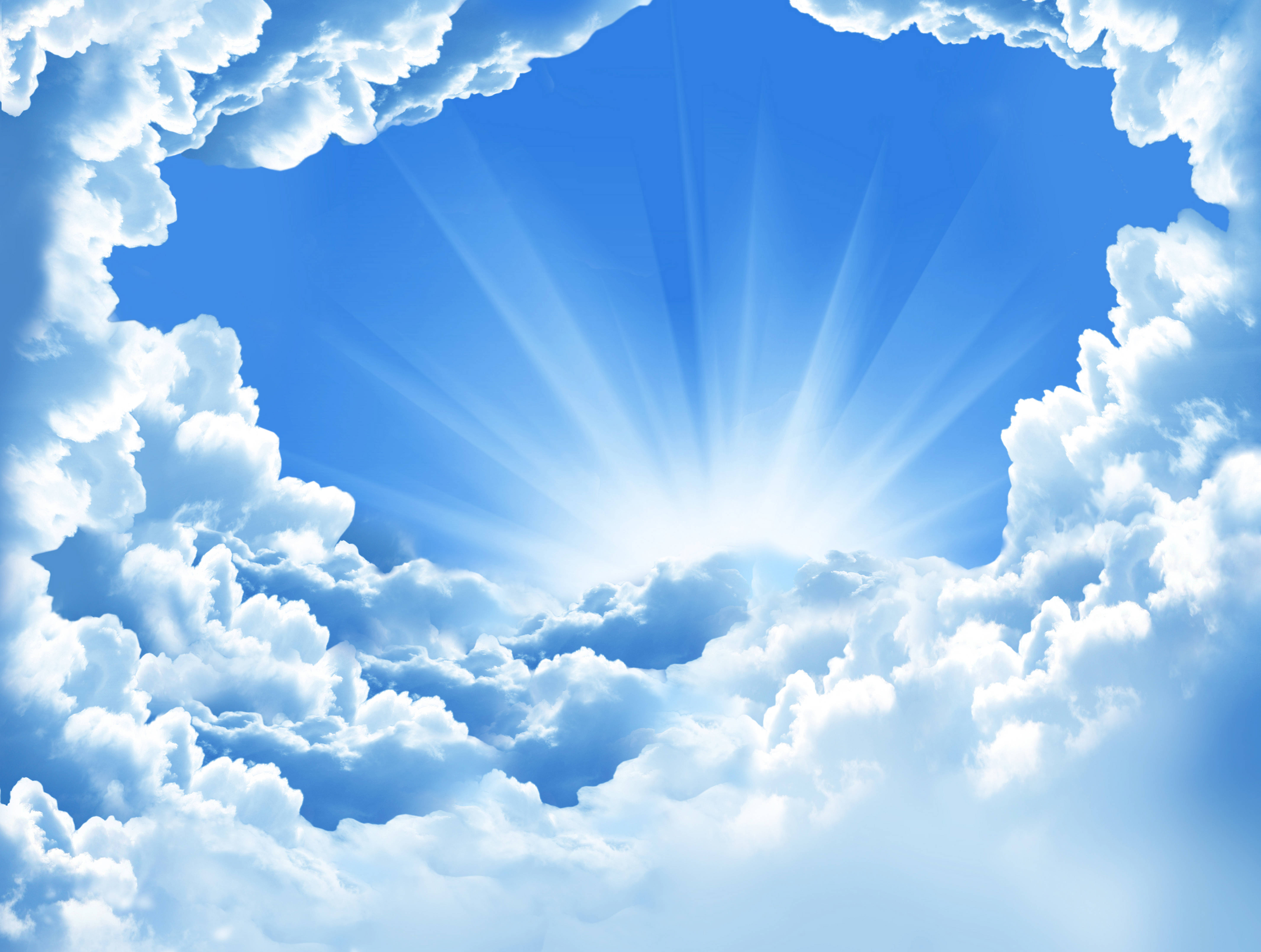 天空 桌布 壁紙 — 燦爛的陽光穿透蓬鬆的白雲，映襯著充滿活力的藍天。