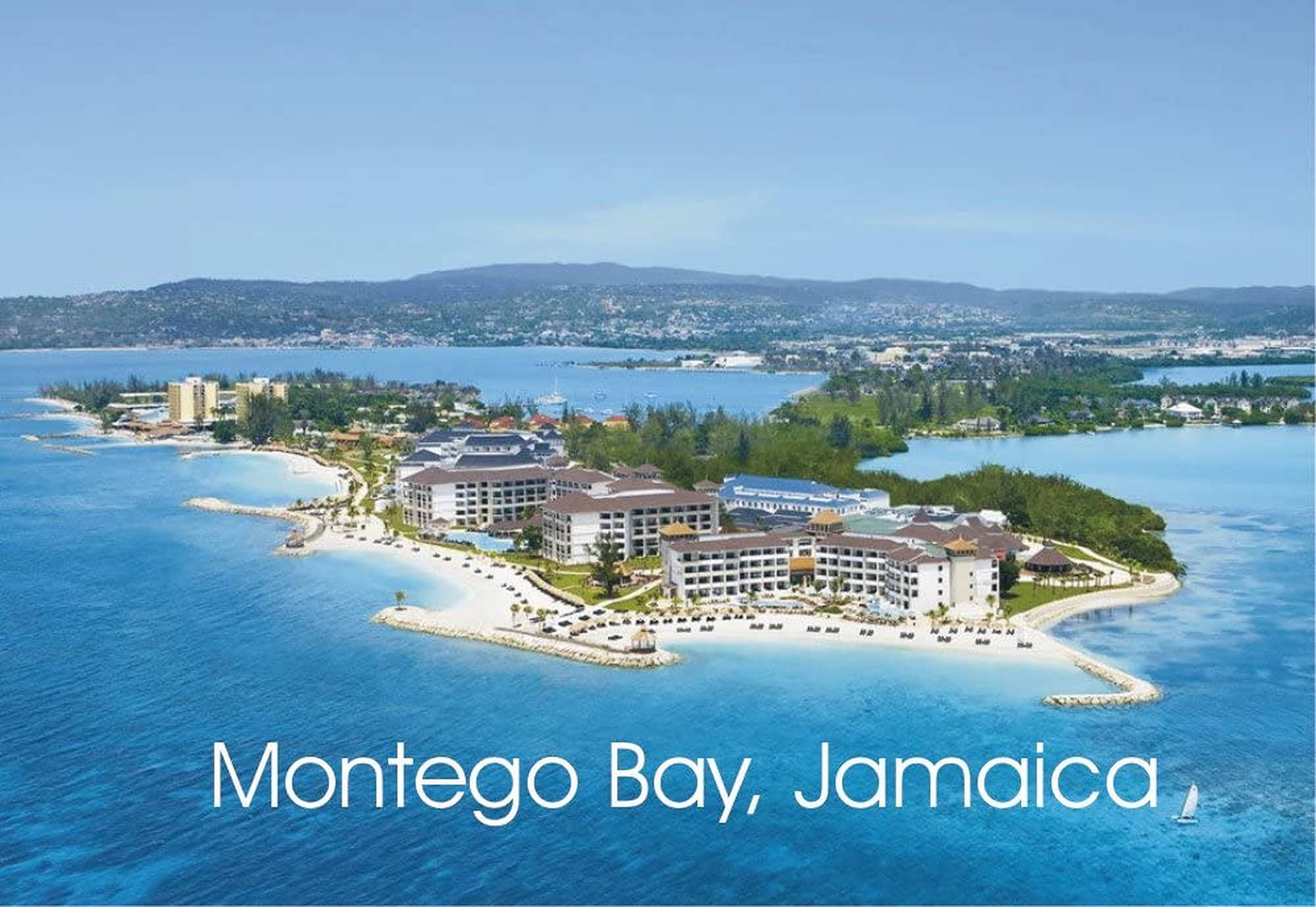 Jamaica Beach 桌布 壁紙 — 牙買加蒙特哥灣一個熱帶島嶼上的豪華度假村，擁有白色沙灘和碧綠海水的鳥瞰圖。