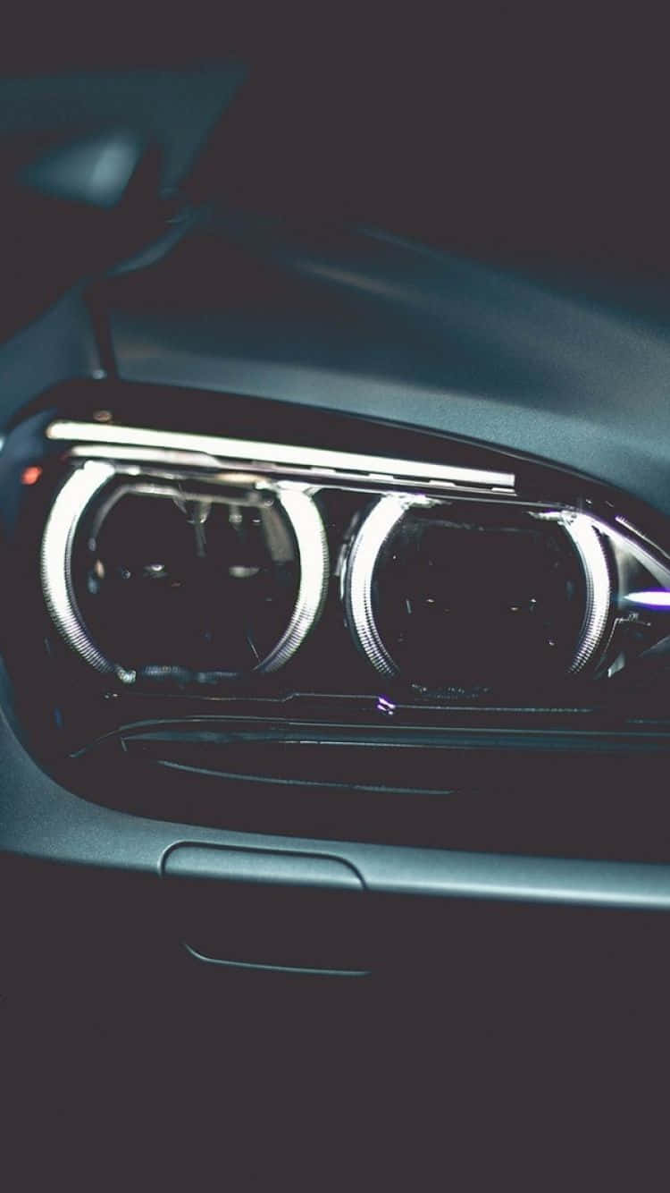 特寫現代汽車車頭燈在黑暗中發光。 — BMW 動圖 壁紙