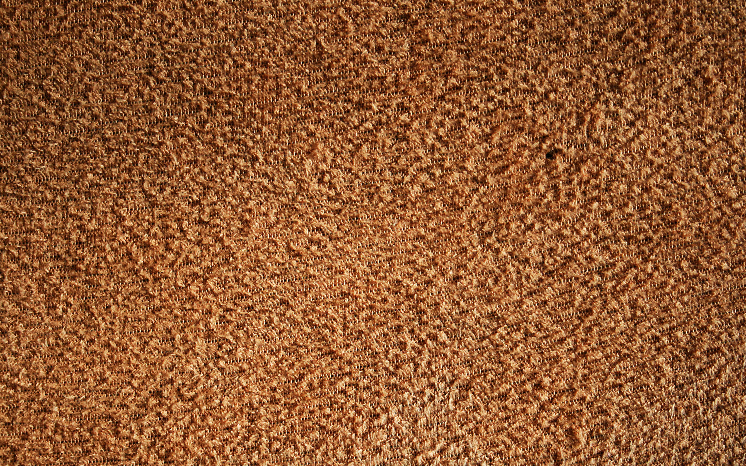 Brown Textured 桌布 壁紙 — 特寫鏡頭：豐富的棕色紋理地毯，纖維多樣，色調變化微妙。