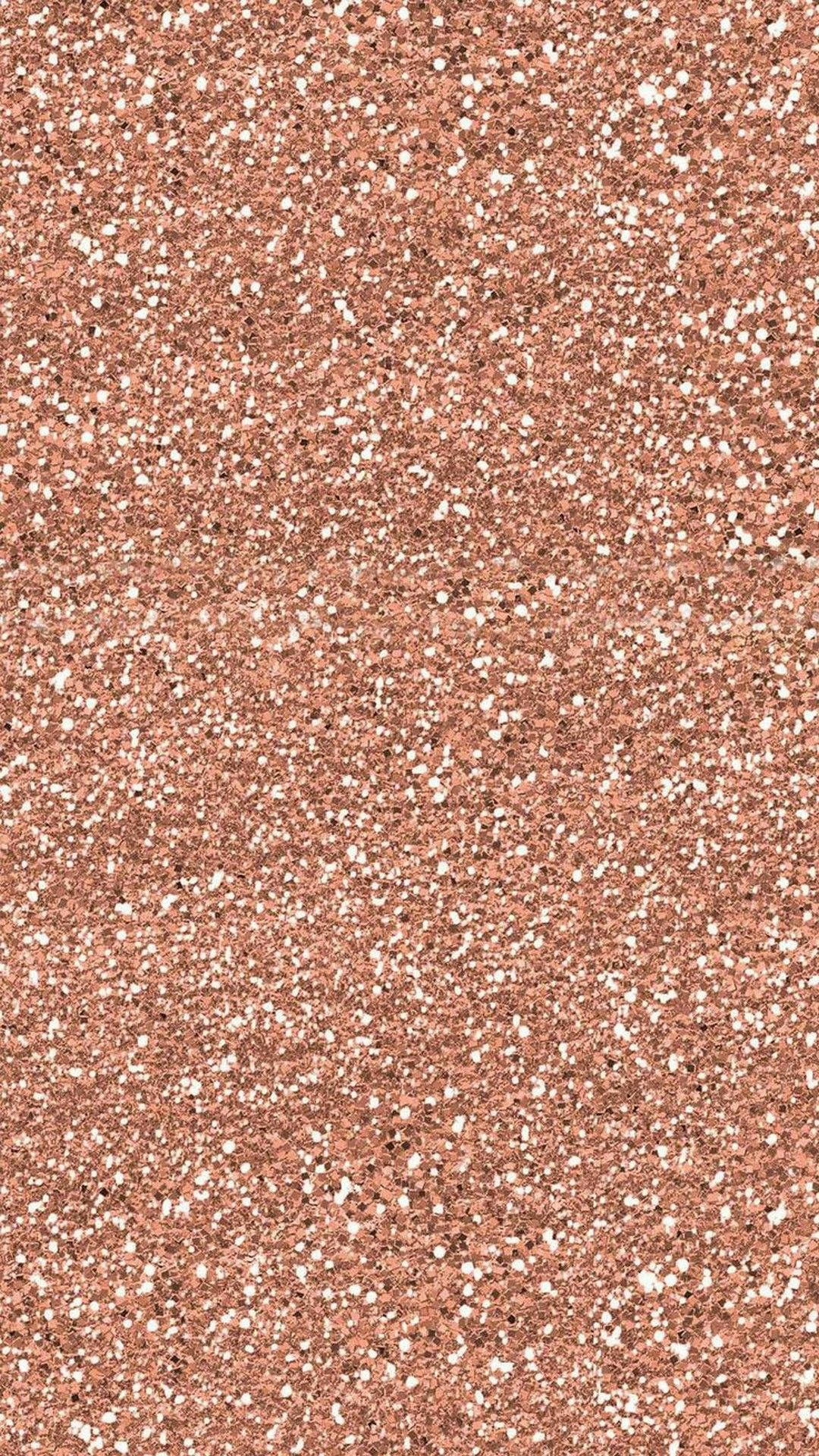 Rose Gold Aesthetic 桌布 壁紙 — 玫瑰金亮粉的特寫，散落的白色閃光營造出閃爍的紋理表面。