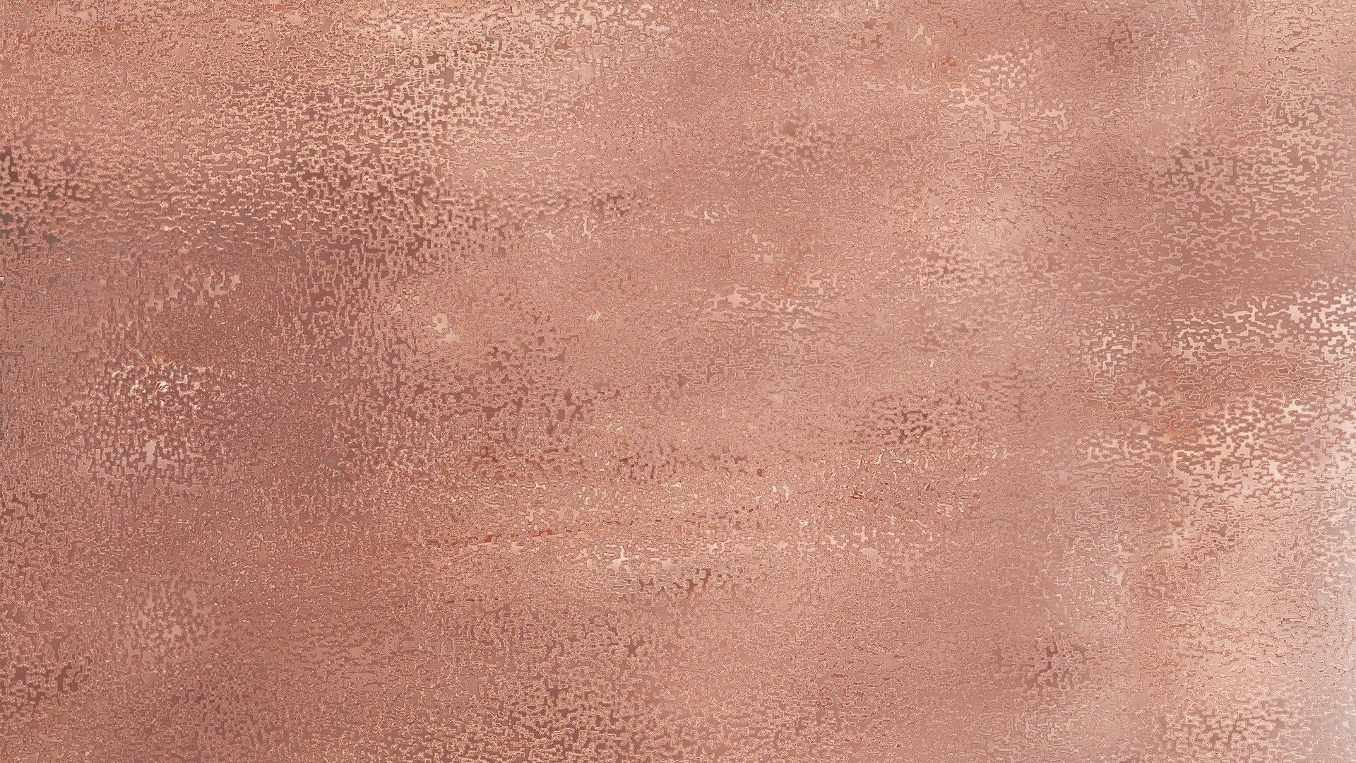 Cute Rose Gold 桌布 壁紙 — 玫瑰金紋理表面的特寫，帶有細微斑點和柔和漸變。